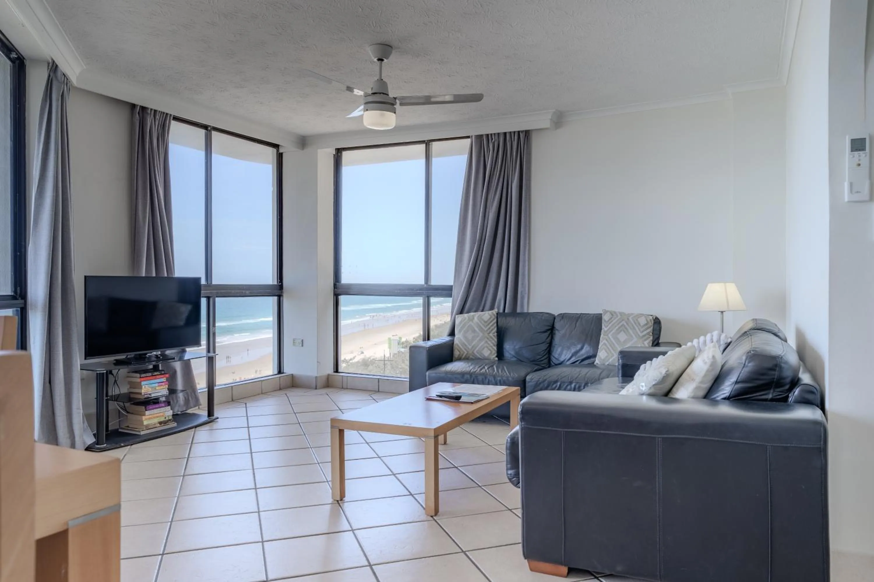 Living room in Olympus Beachfront Apartments