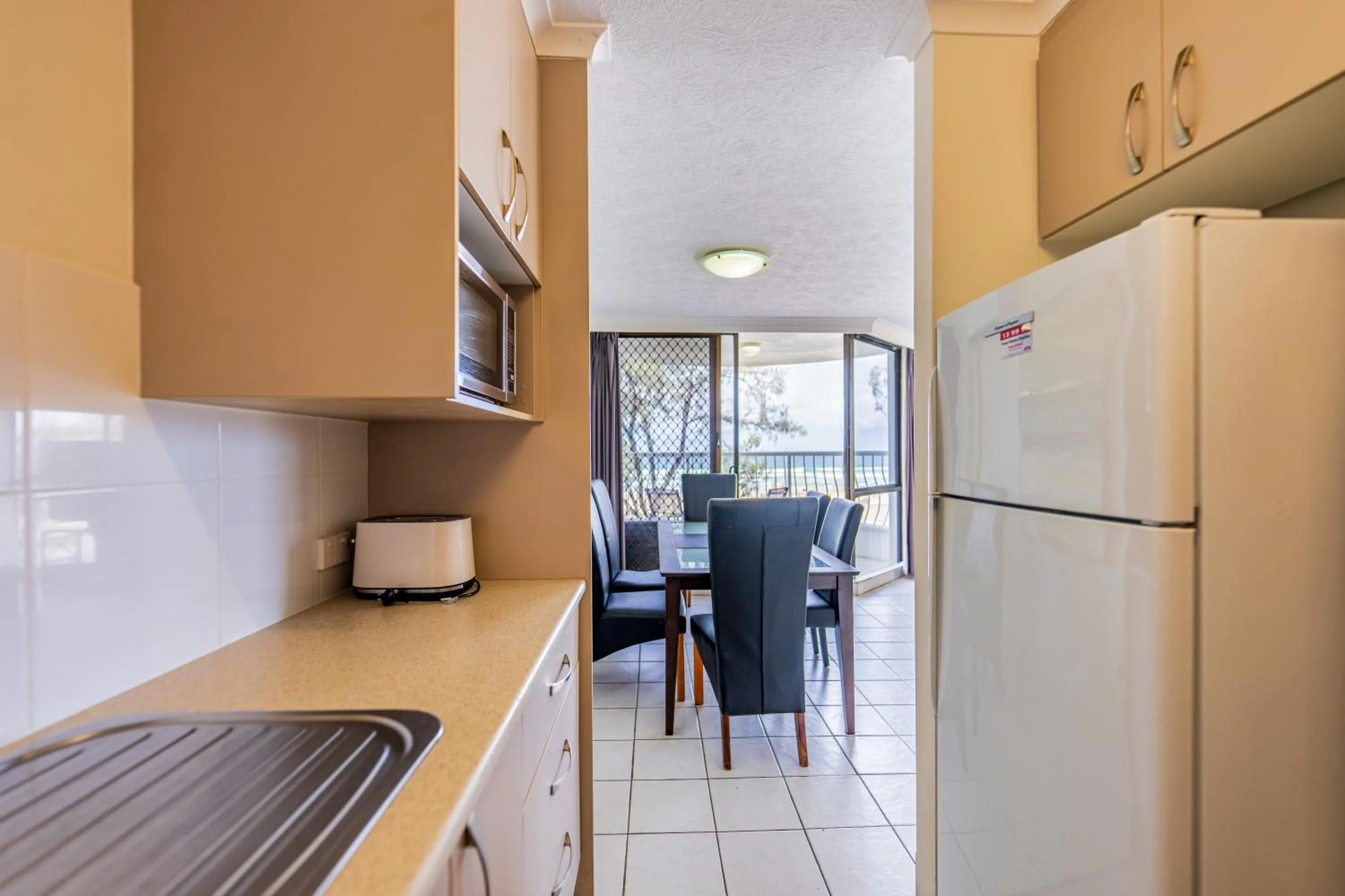 Dining area in Olympus Beachfront Apartments