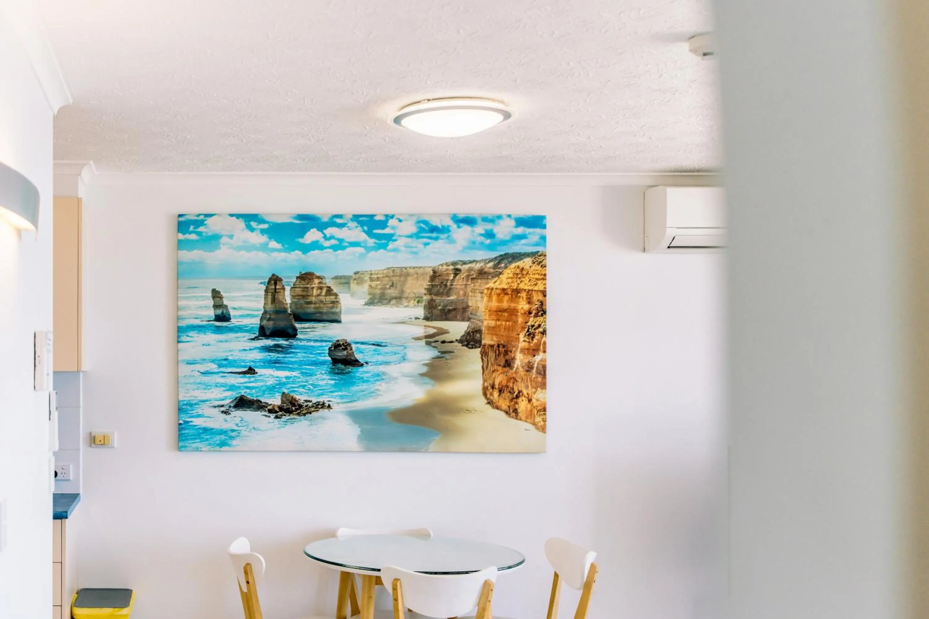 Dining area in Olympus Beachfront Apartments