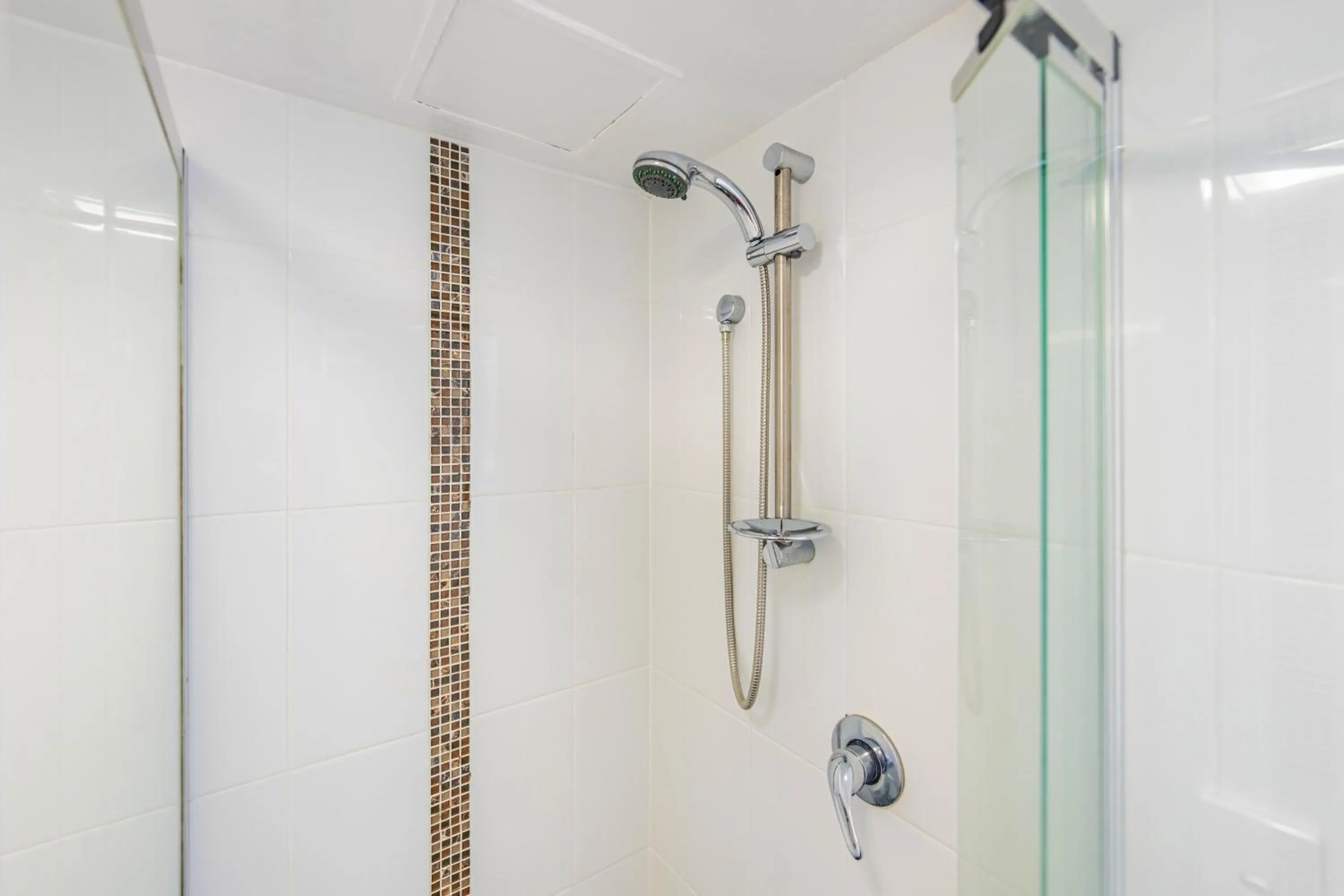 Shower in Olympus Beachfront Apartments