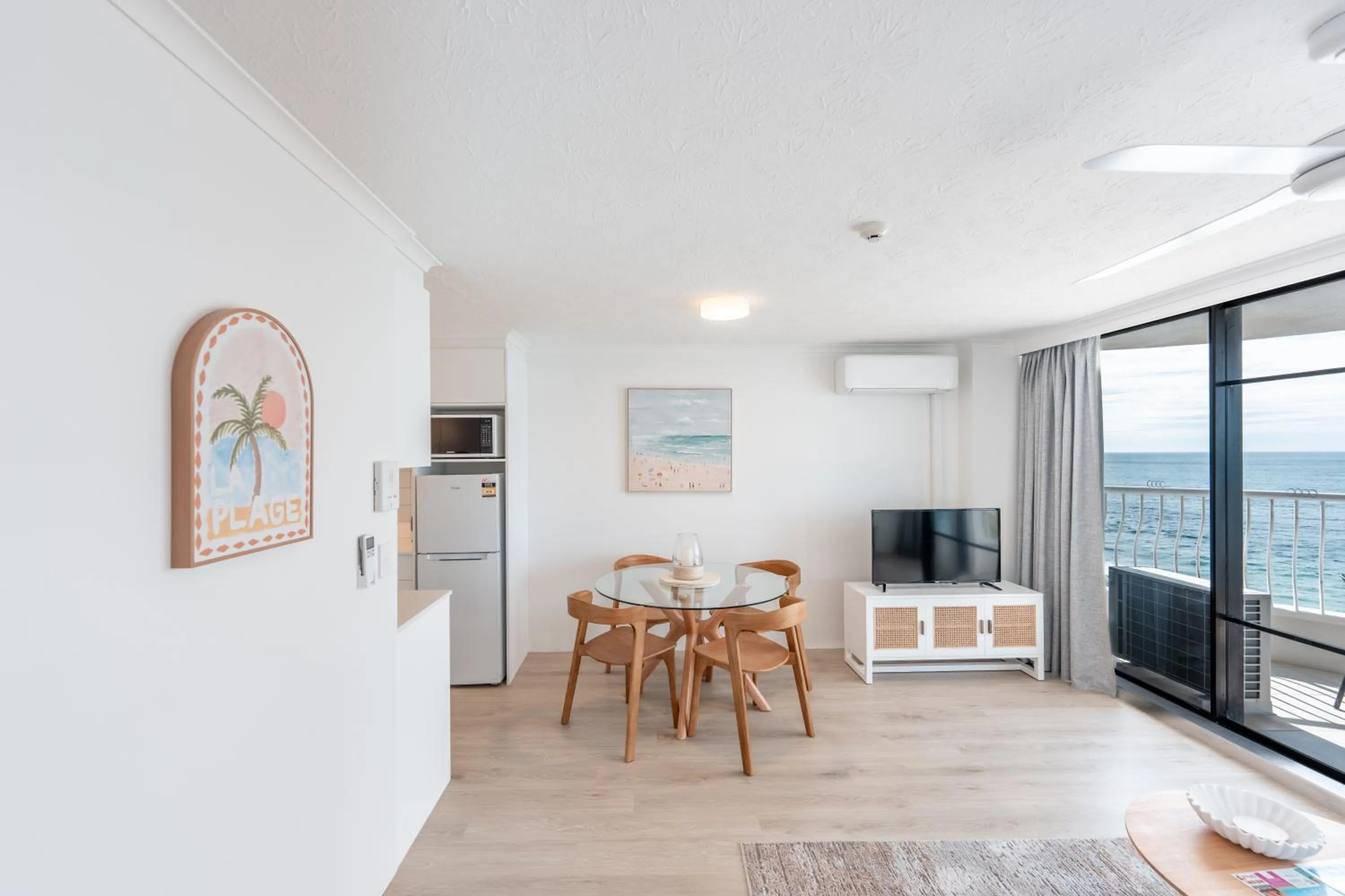 Dining area in Olympus Beachfront Apartments