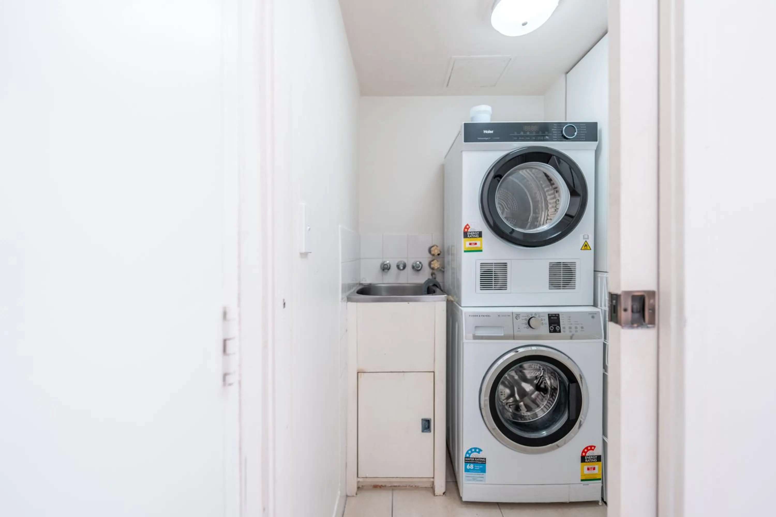 laundry in Olympus Beachfront Apartments