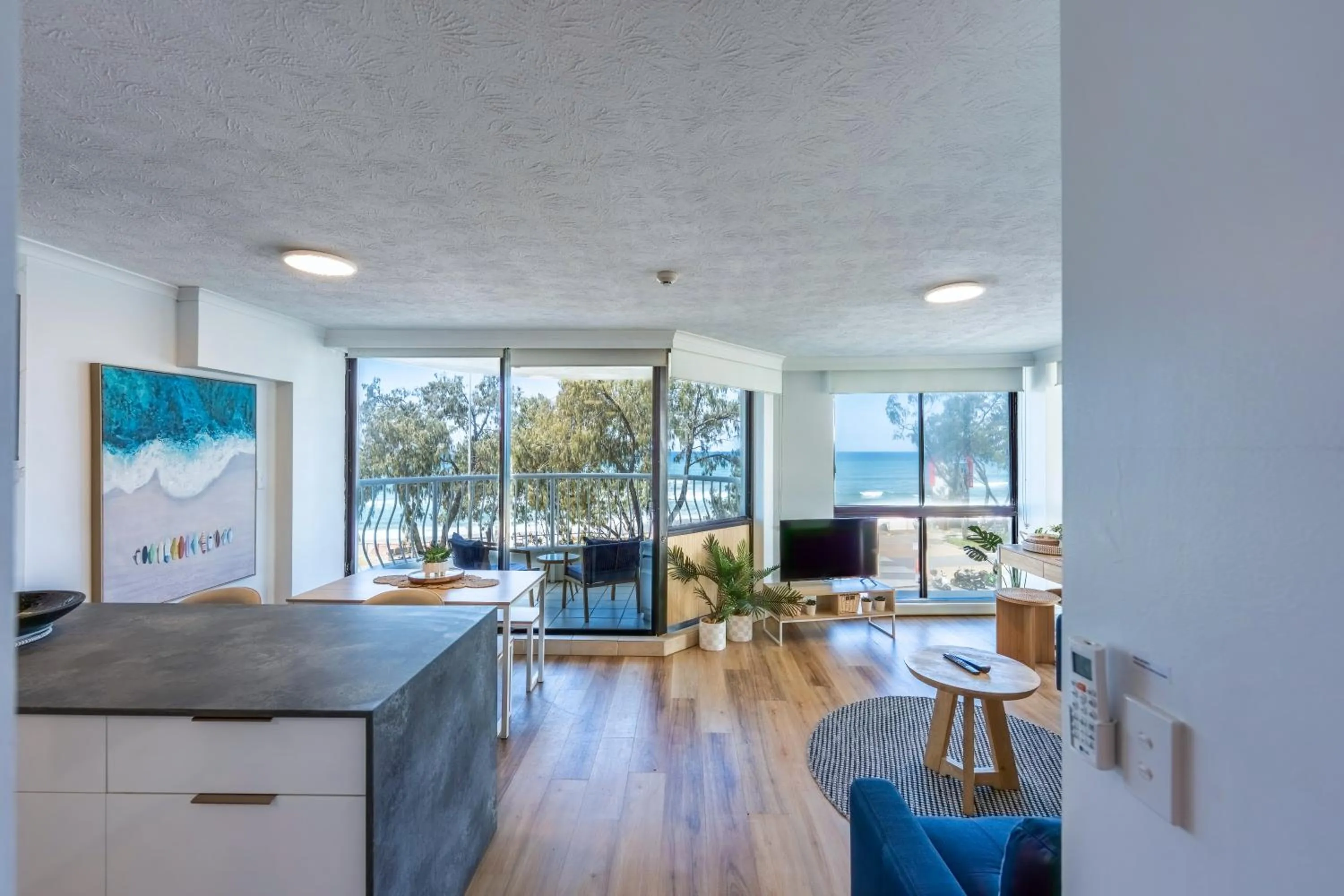 Living room in Olympus Beachfront Apartments