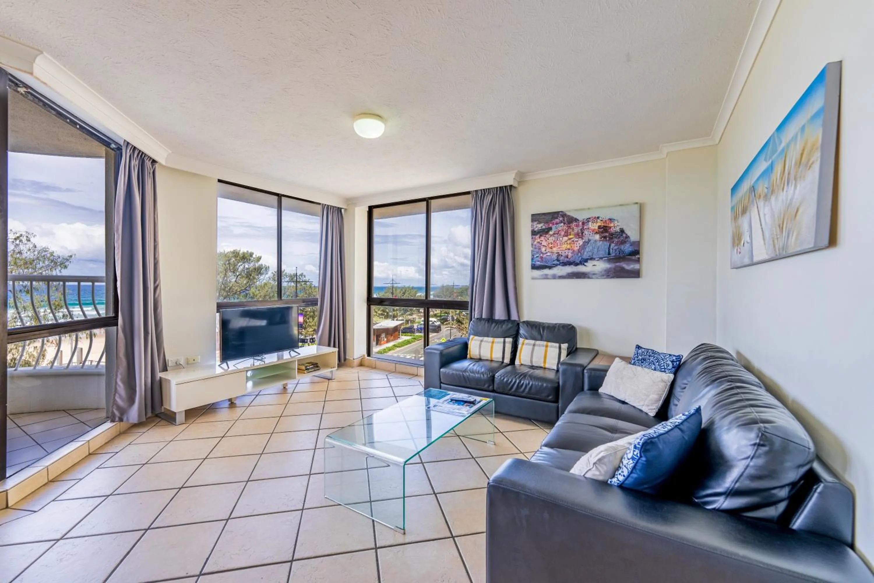 Living room in Olympus Beachfront Apartments