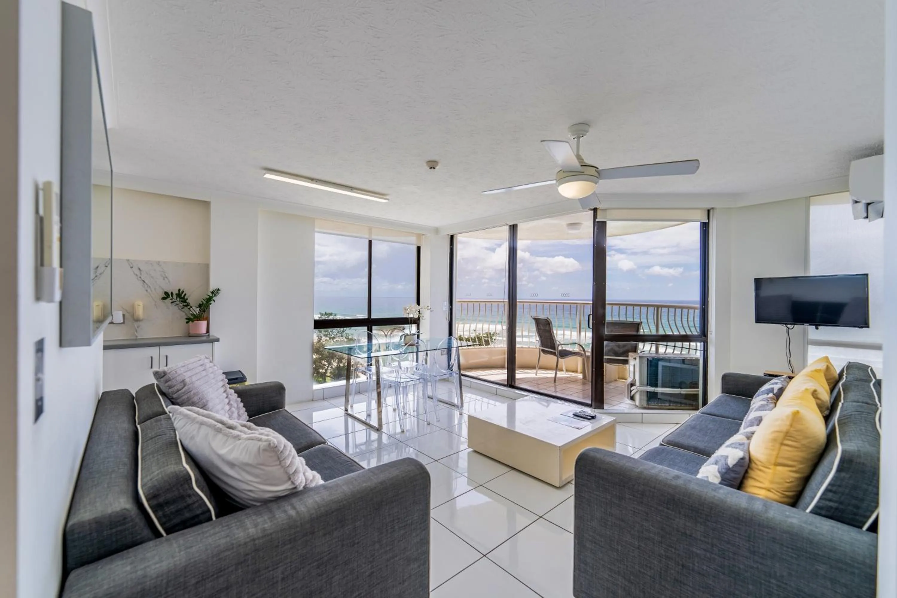 Living room in Olympus Beachfront Apartments