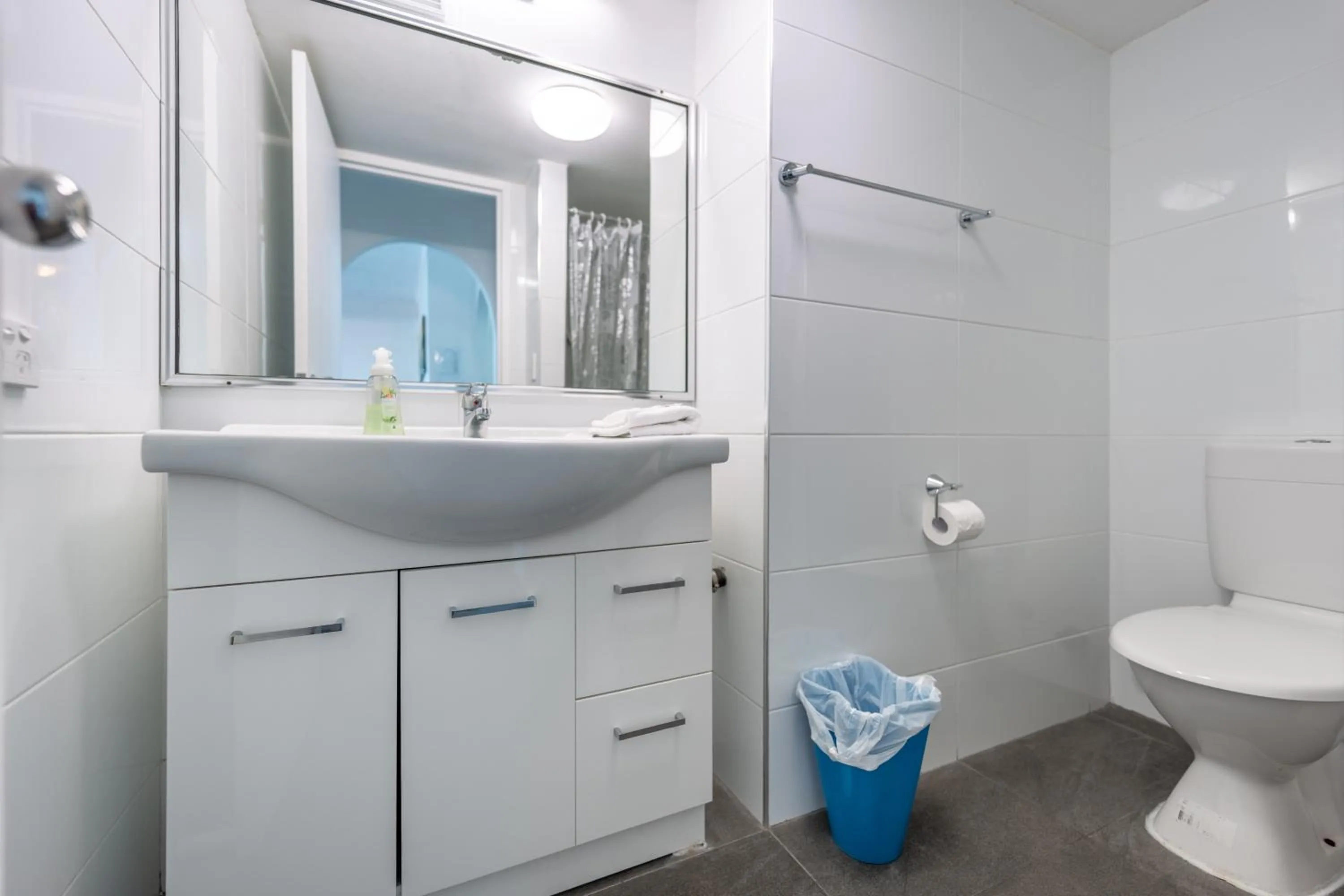 Bathroom in Olympus Beachfront Apartments