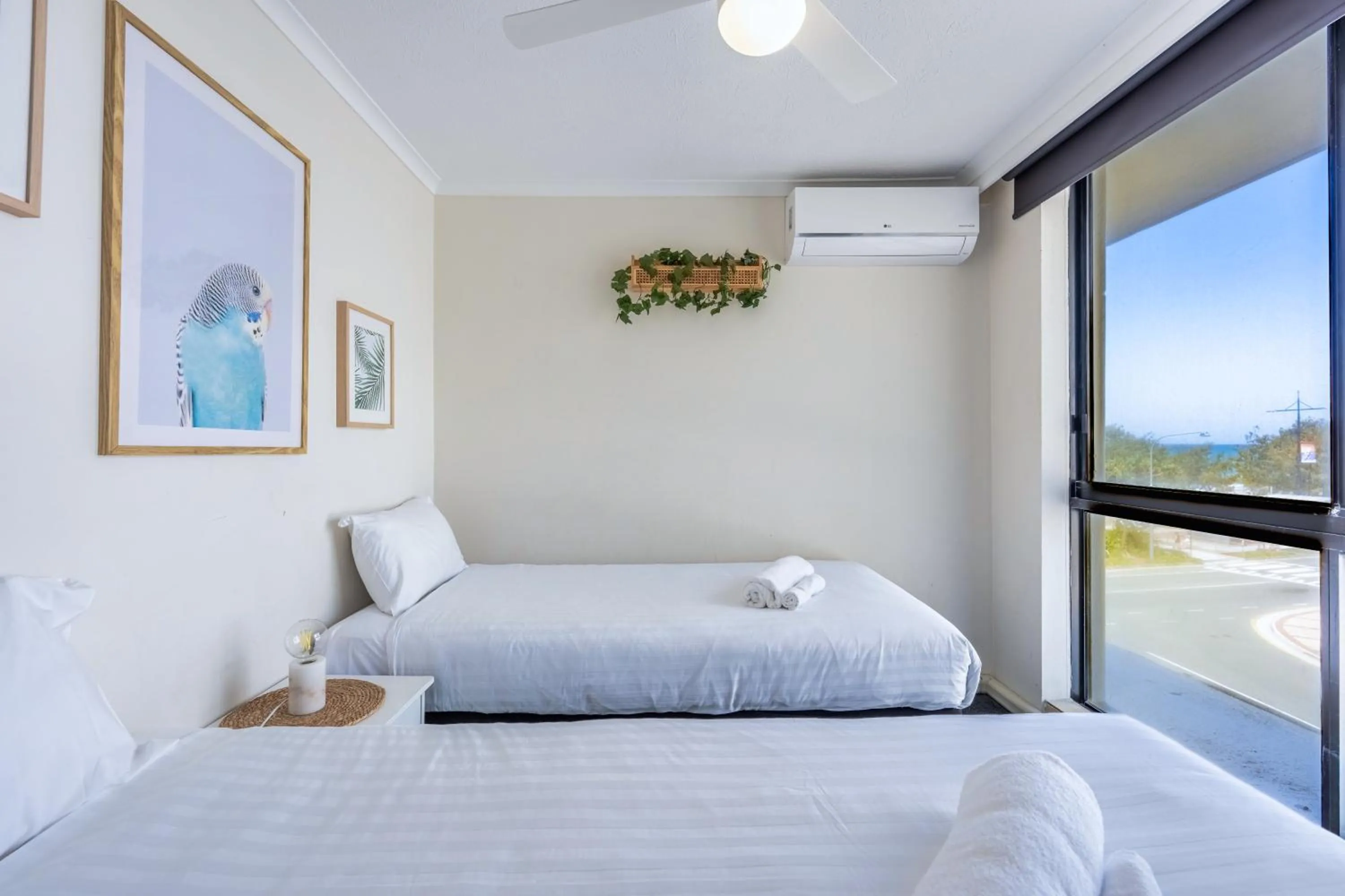 Bedroom, Bed in Olympus Beachfront Apartments