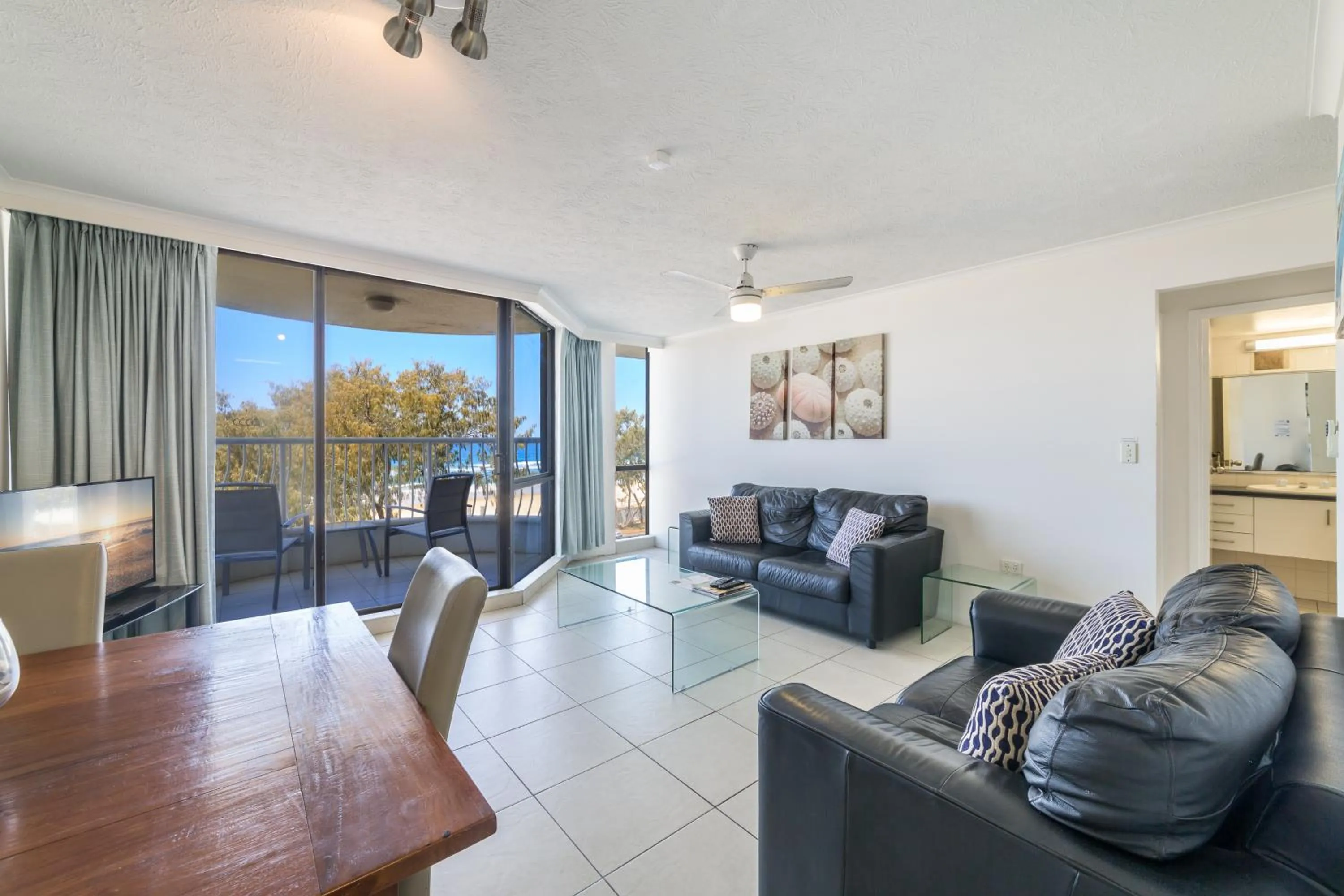 Living room in Olympus Beachfront Apartments