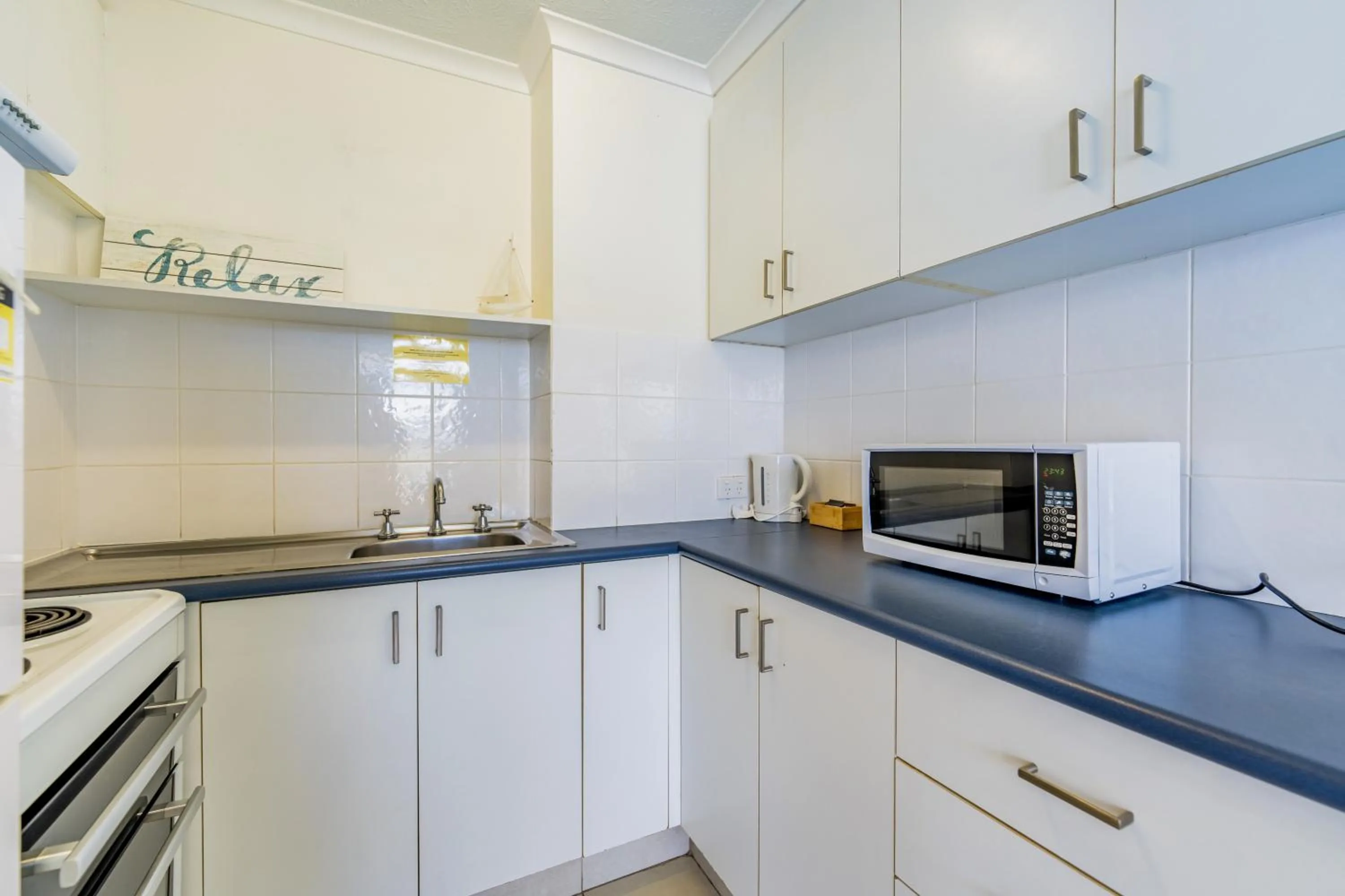 kitchen in Olympus Beachfront Apartments