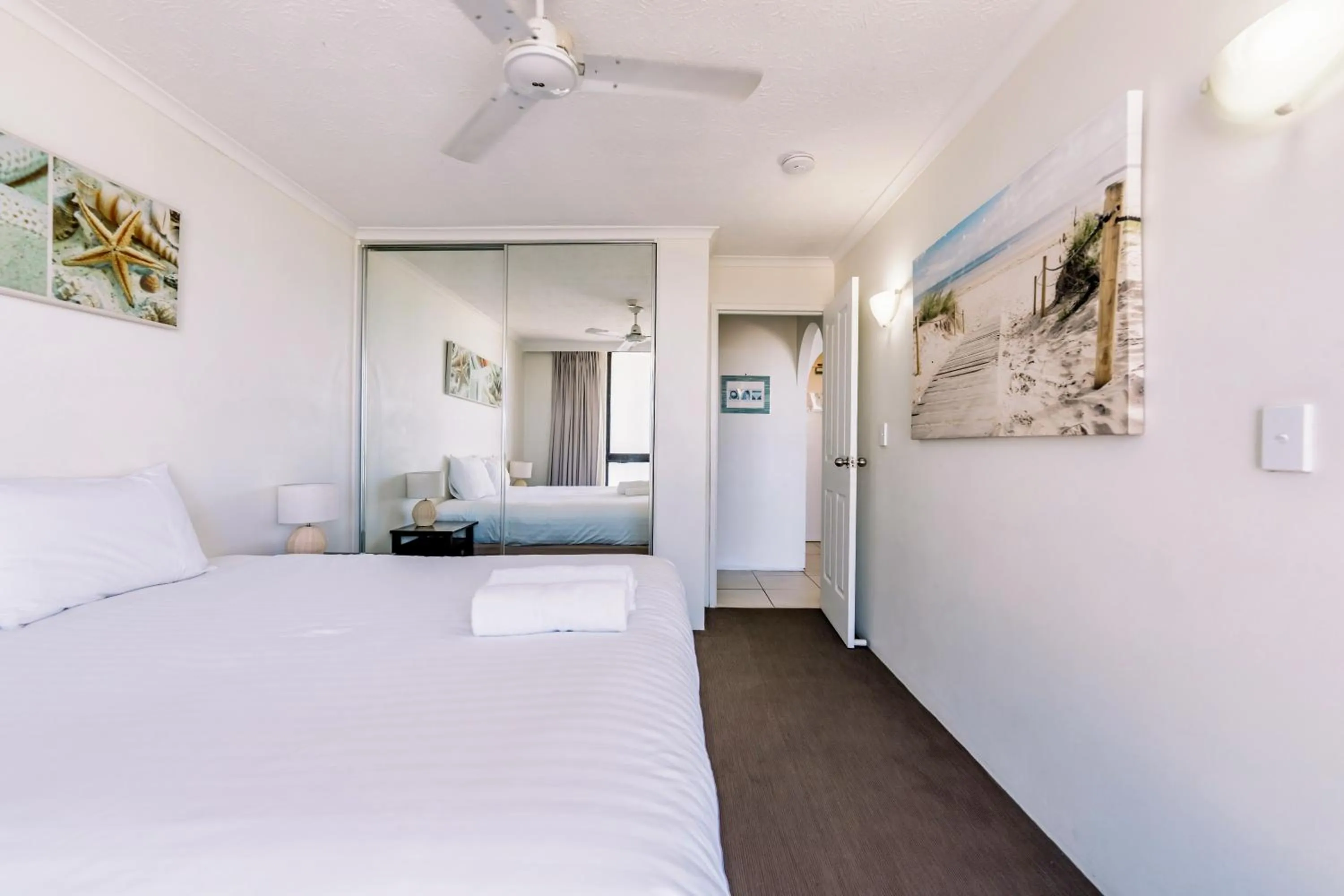 Living room, Bed in Olympus Beachfront Apartments