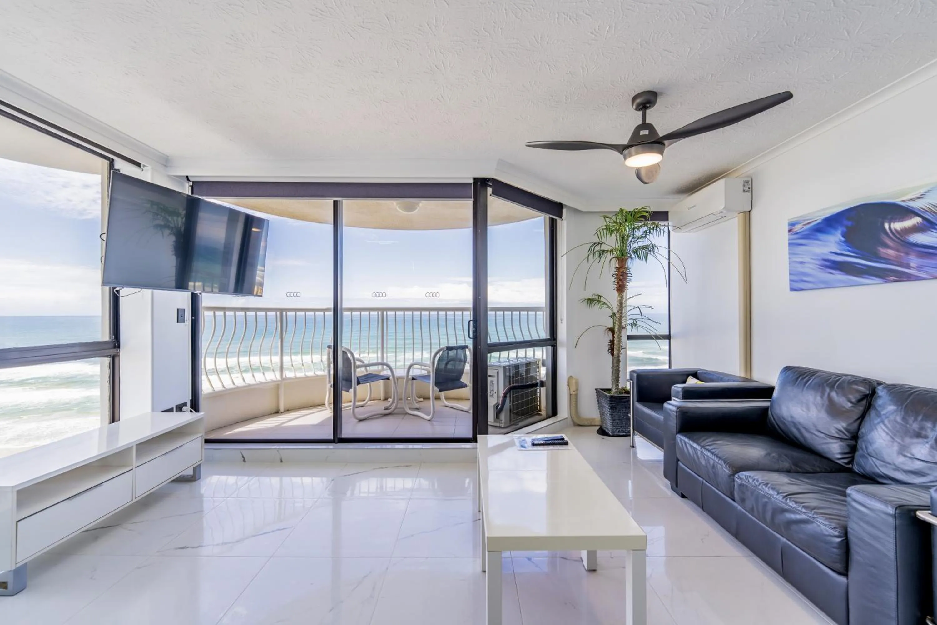 Living room in Olympus Beachfront Apartments