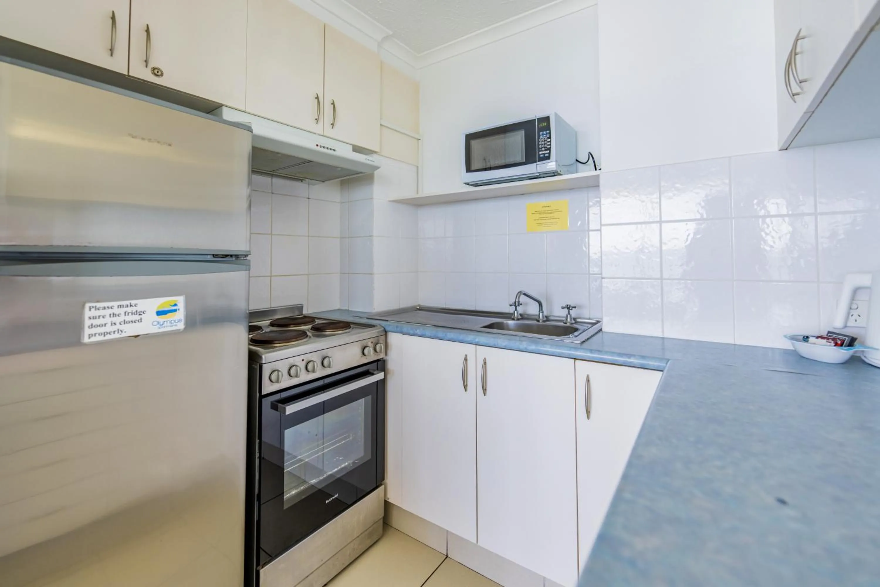 kitchen in Olympus Beachfront Apartments