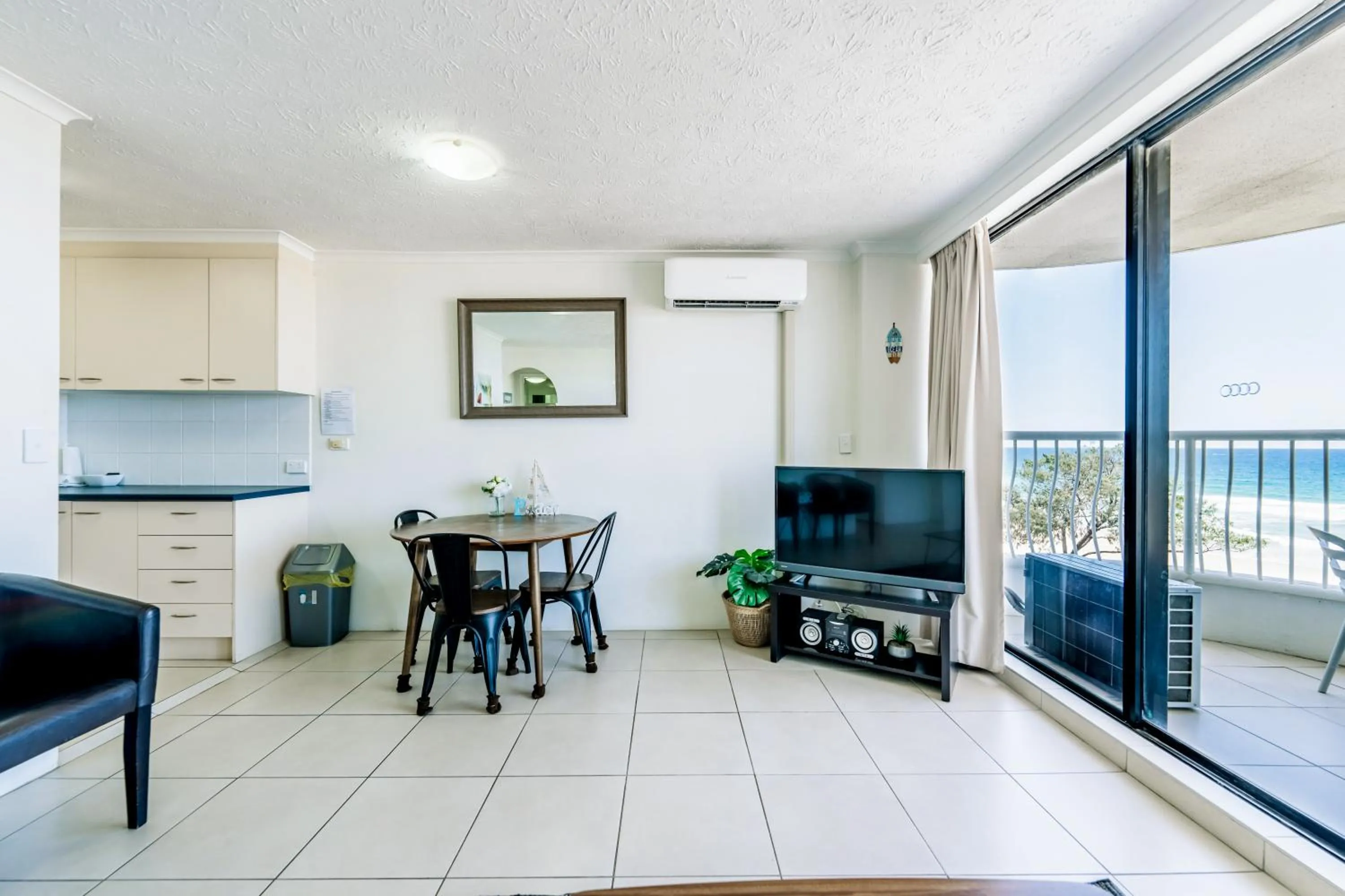 Dining area in Olympus Beachfront Apartments