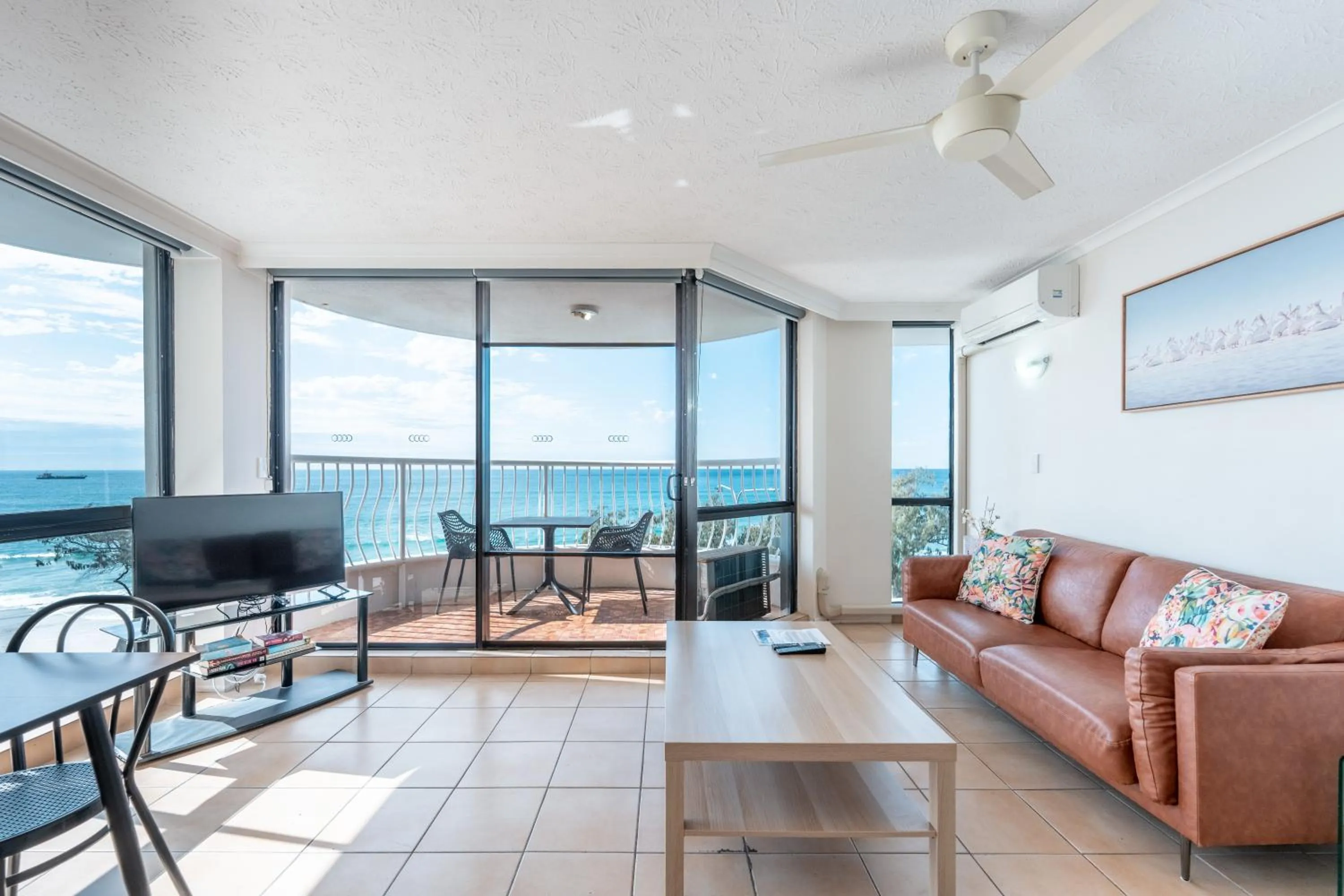 Living room in Olympus Beachfront Apartments