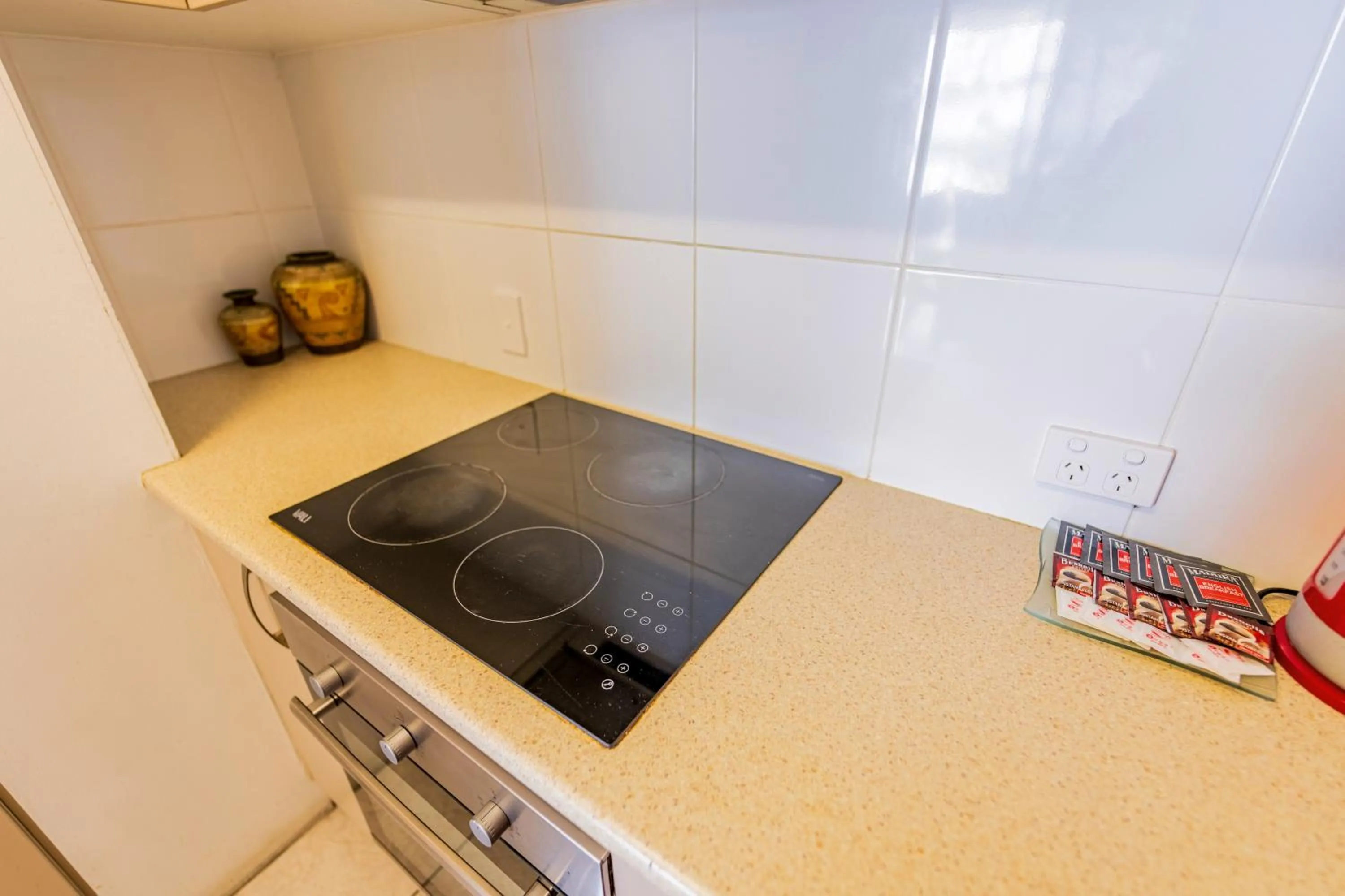 kitchen in Olympus Beachfront Apartments