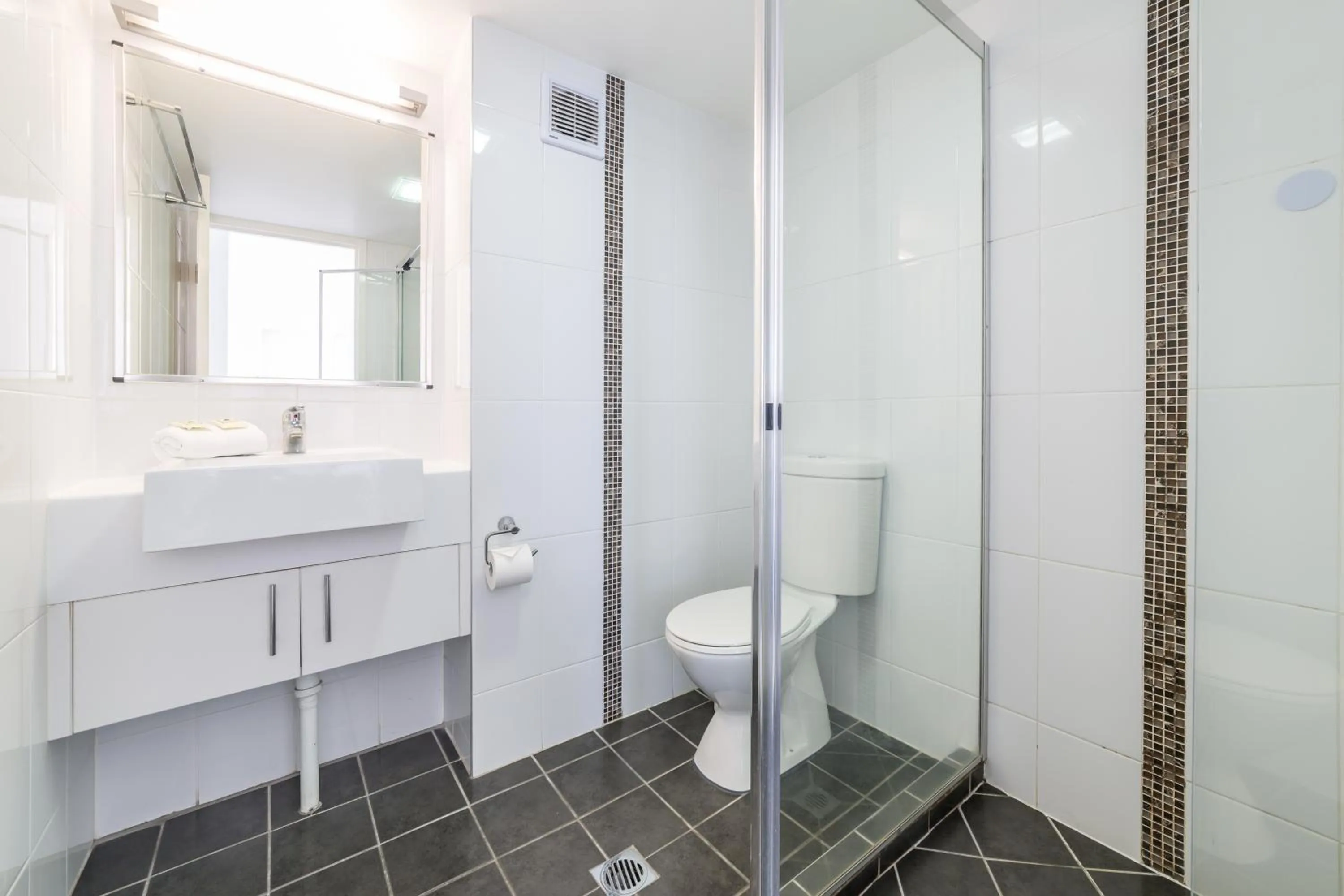 Bathroom in Olympus Beachfront Apartments
