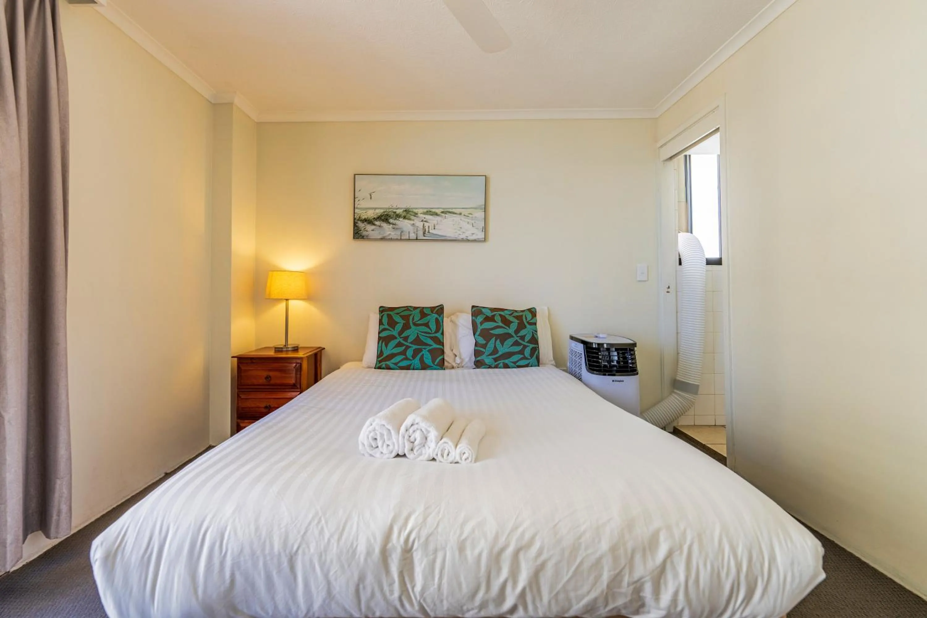 Bedroom, Bed in Olympus Beachfront Apartments