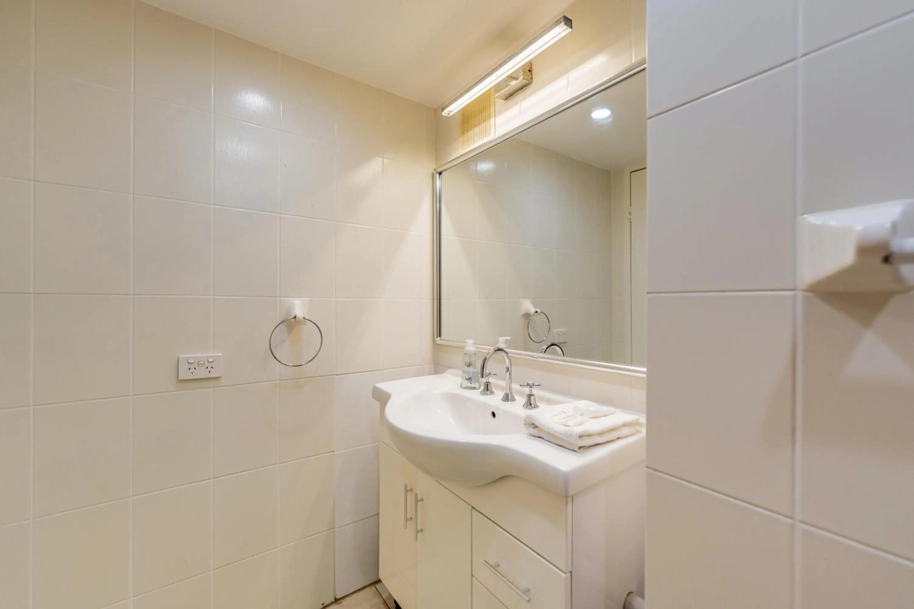 Bathroom in Olympus Beachfront Apartments