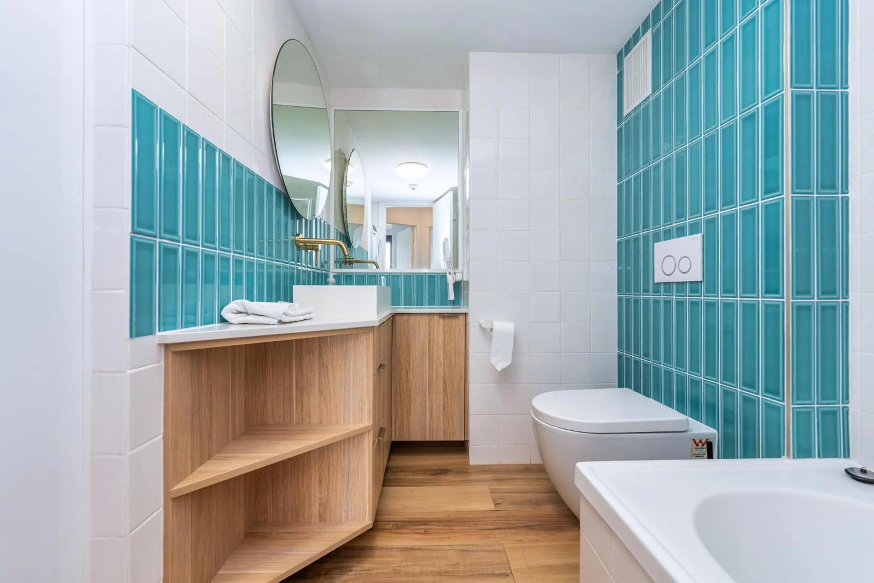 Bathroom in Olympus Beachfront Apartments