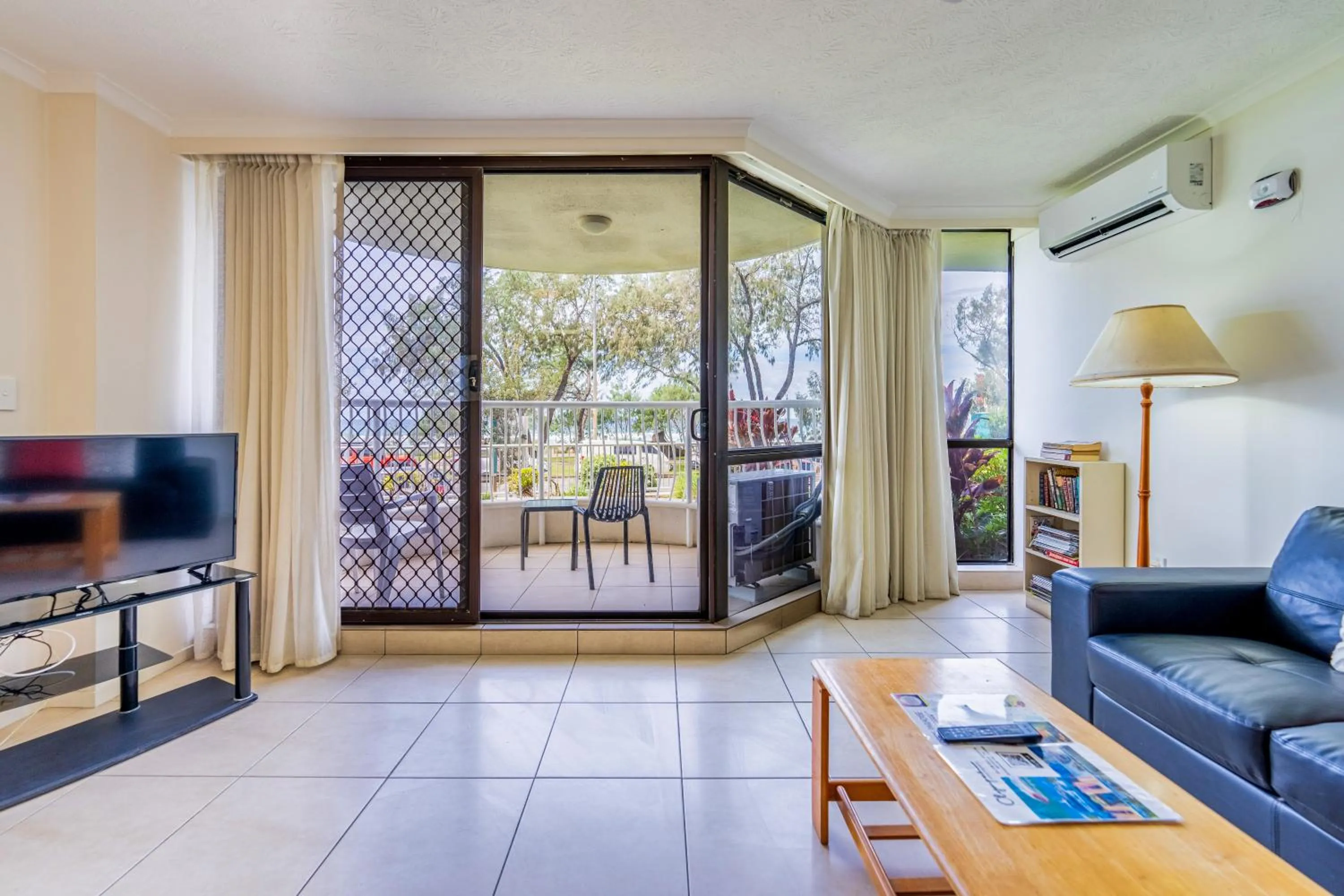 Living room in Olympus Beachfront Apartments