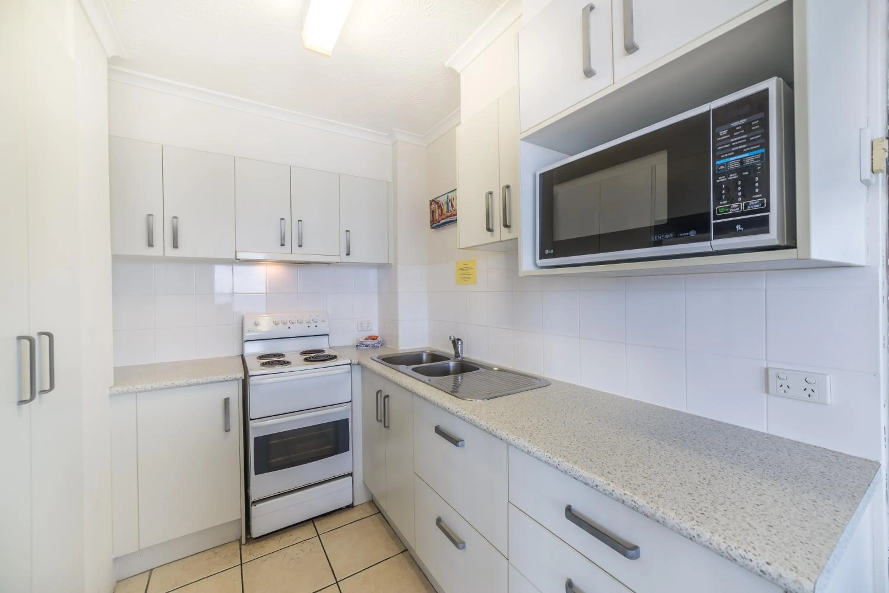 Kitchen or kitchenette in Olympus Beachfront Apartments