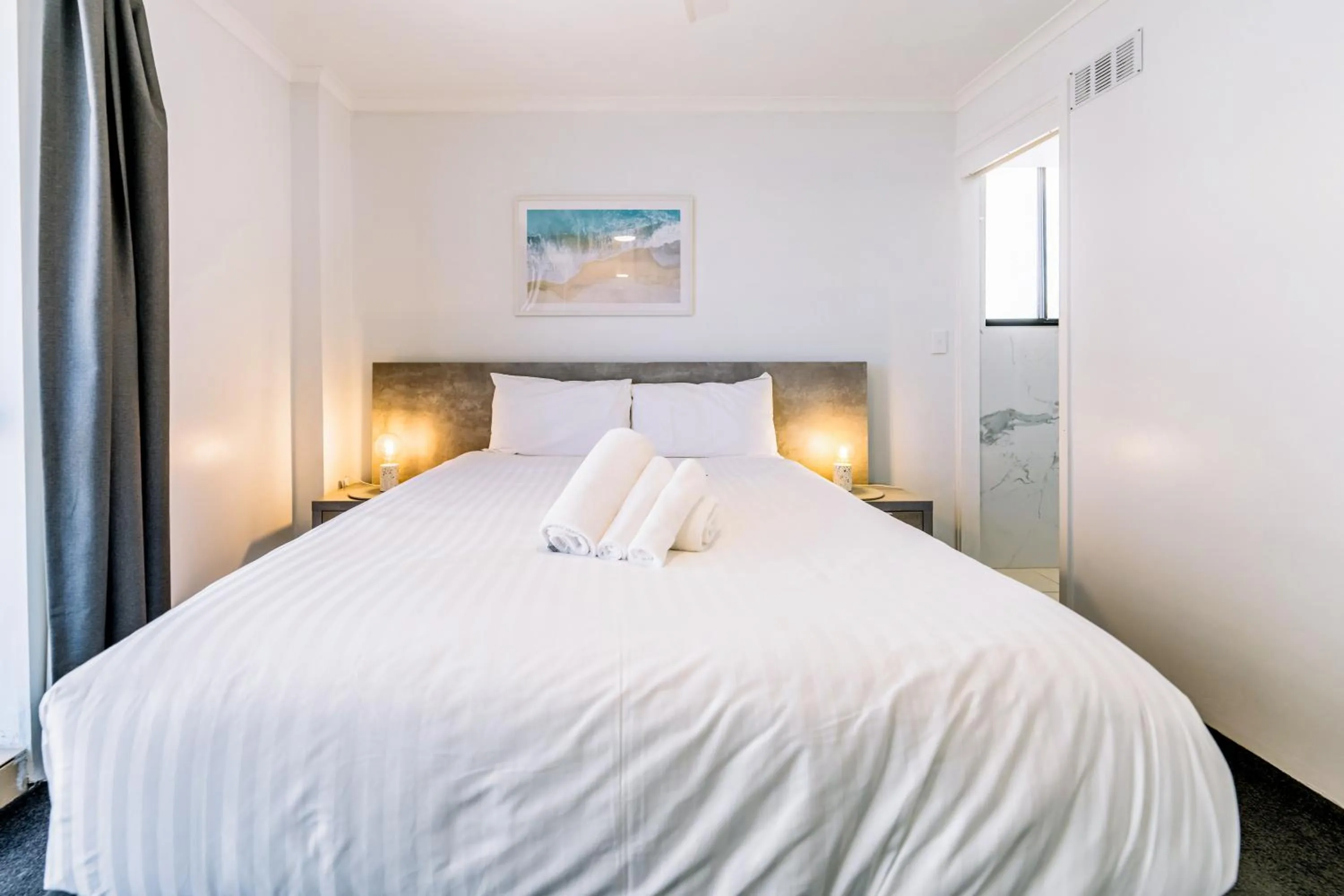 Bedroom, Bed in Olympus Beachfront Apartments