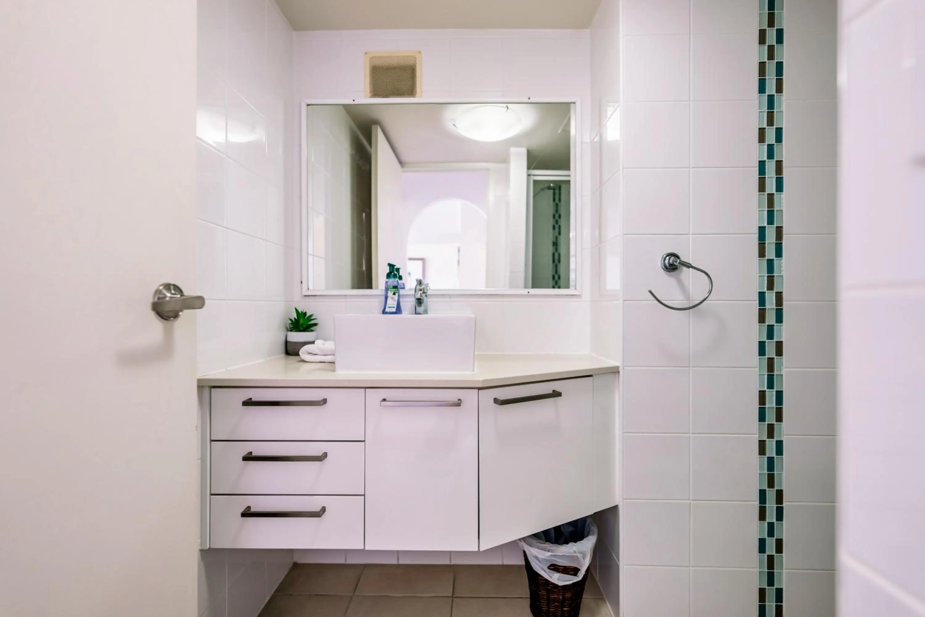 Bathroom in Olympus Beachfront Apartments