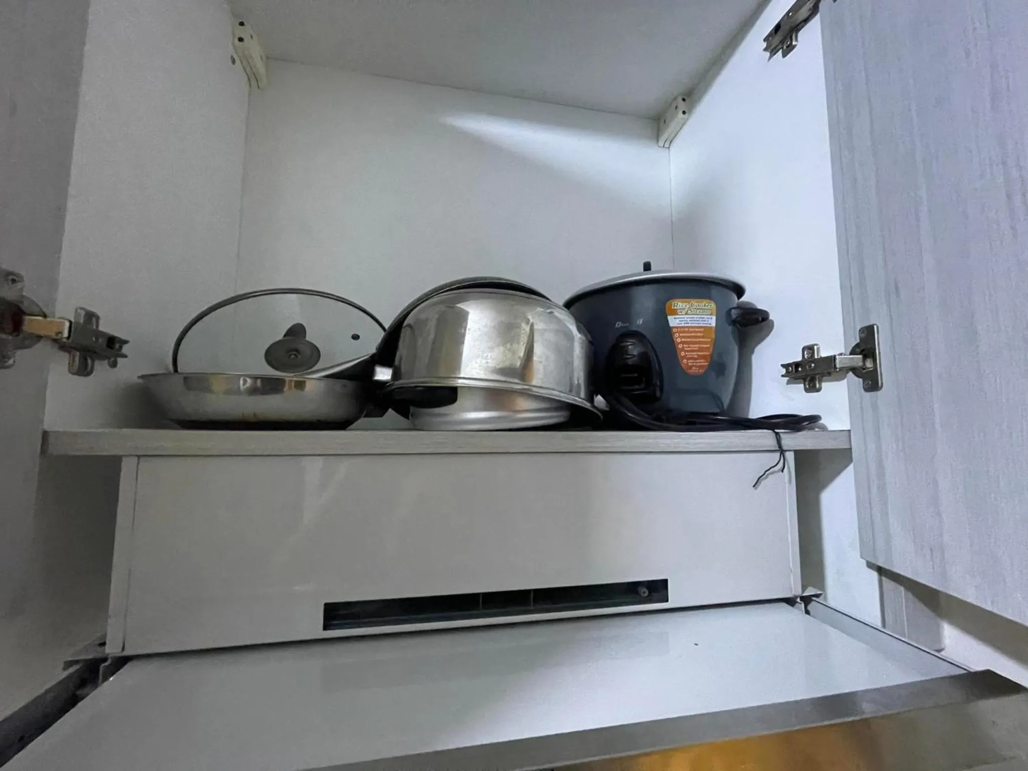 Kitchen or kitchenette in Green Residences Stays by PBYY