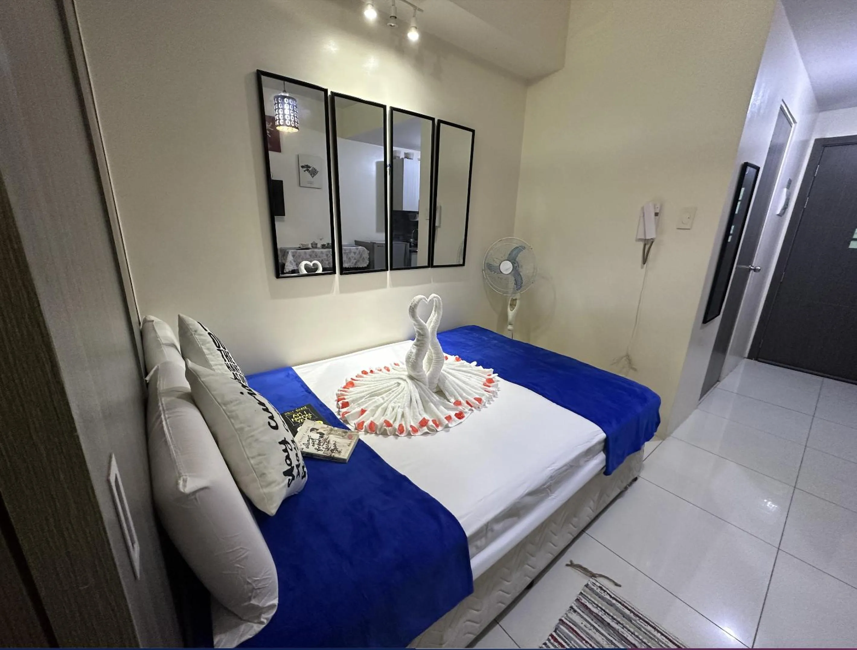 Bed in Green Residences Stays by PBYY