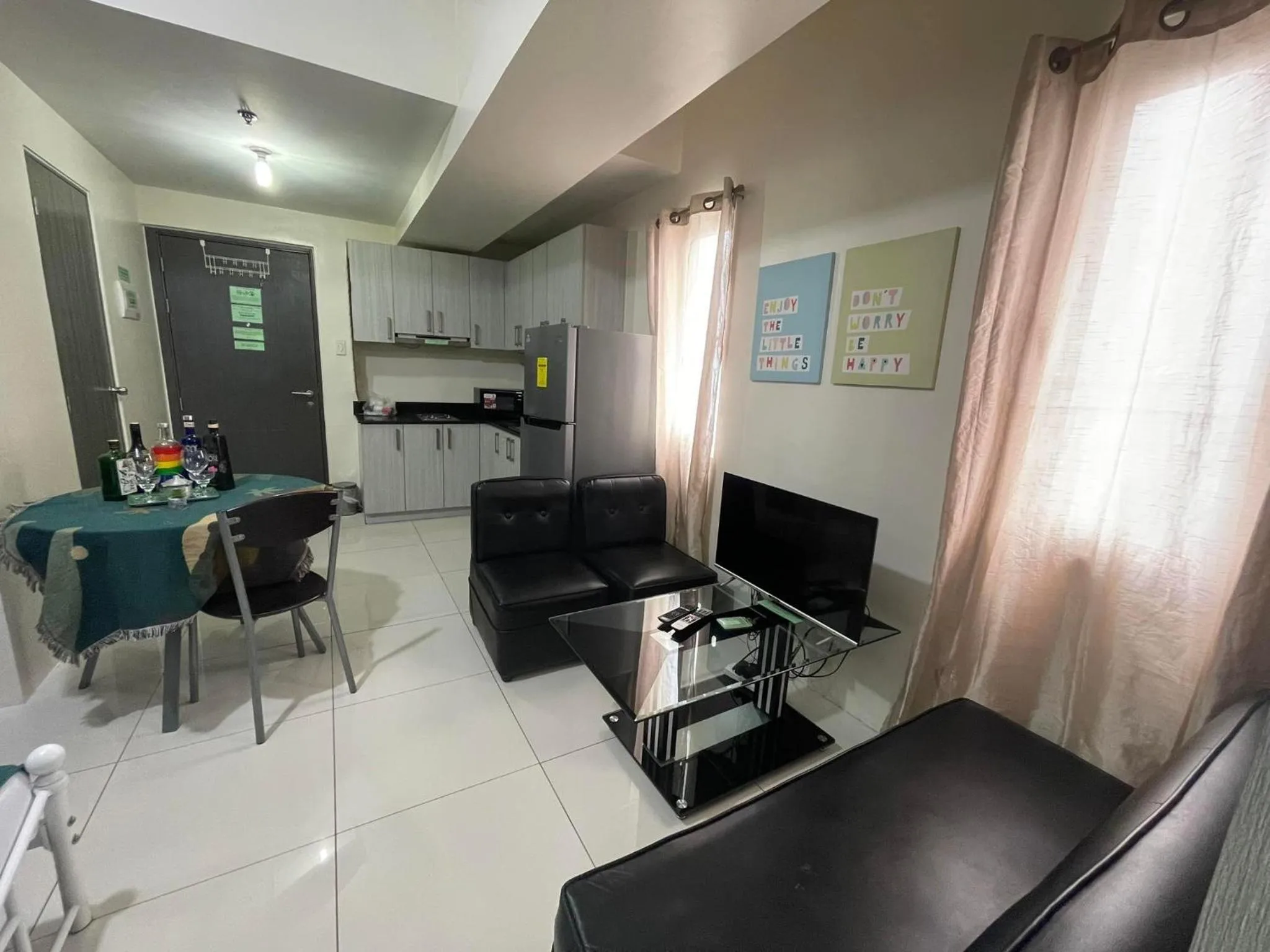 TV and multimedia in Green Residences Stays by PBYY