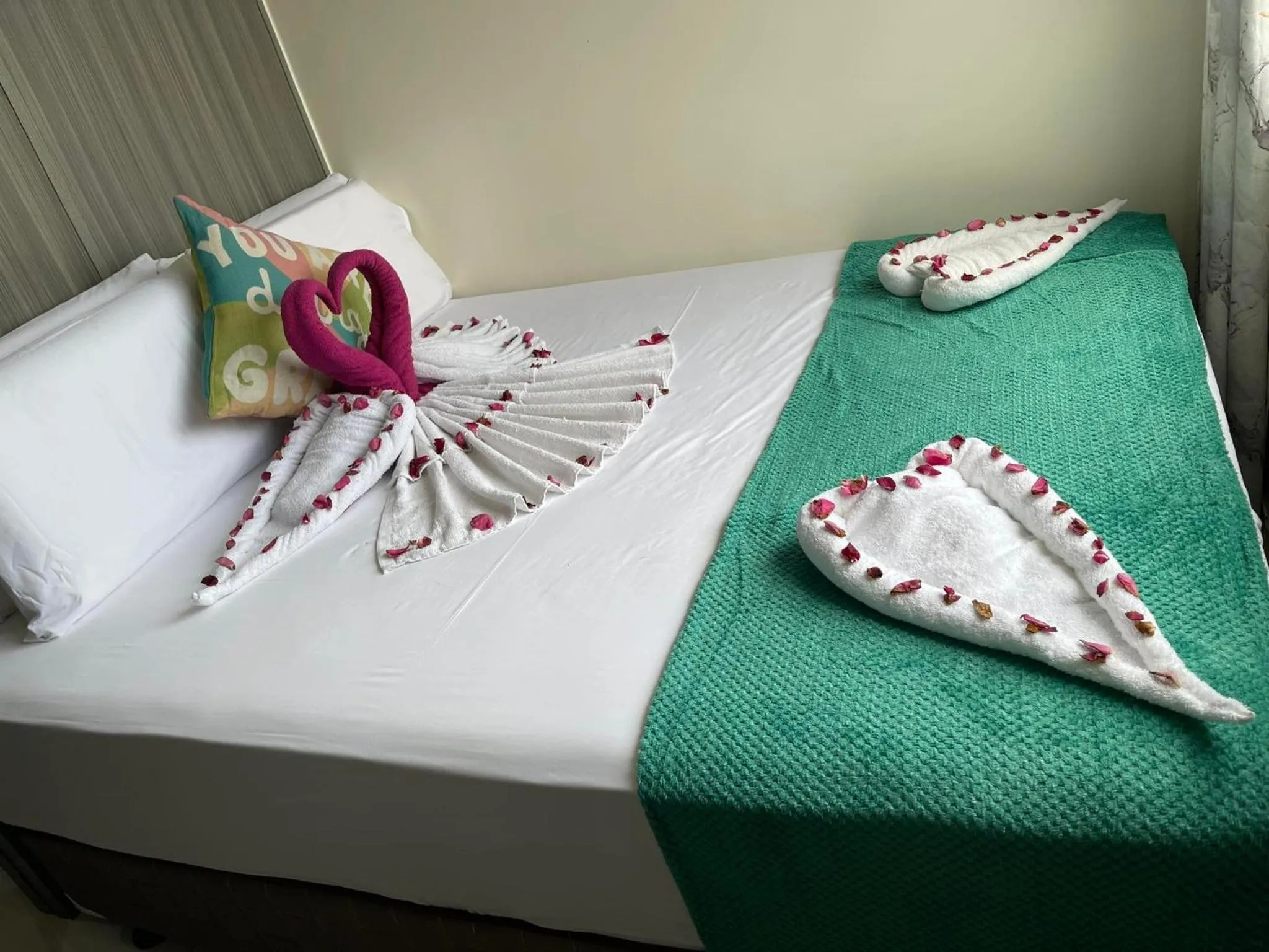 Bed in Green Residences Stays by PBYY