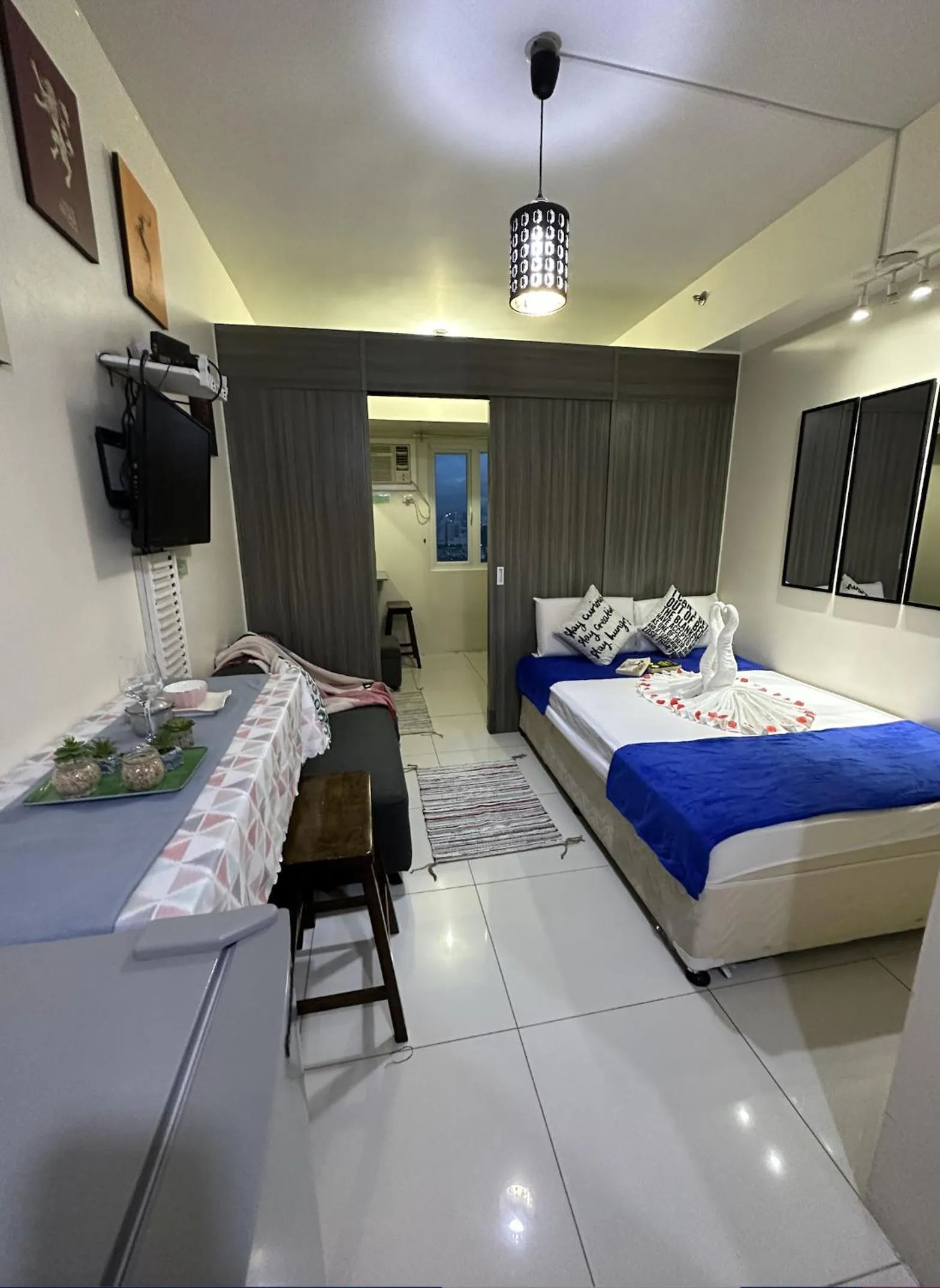 Bed in Green Residences Stays by PBYY