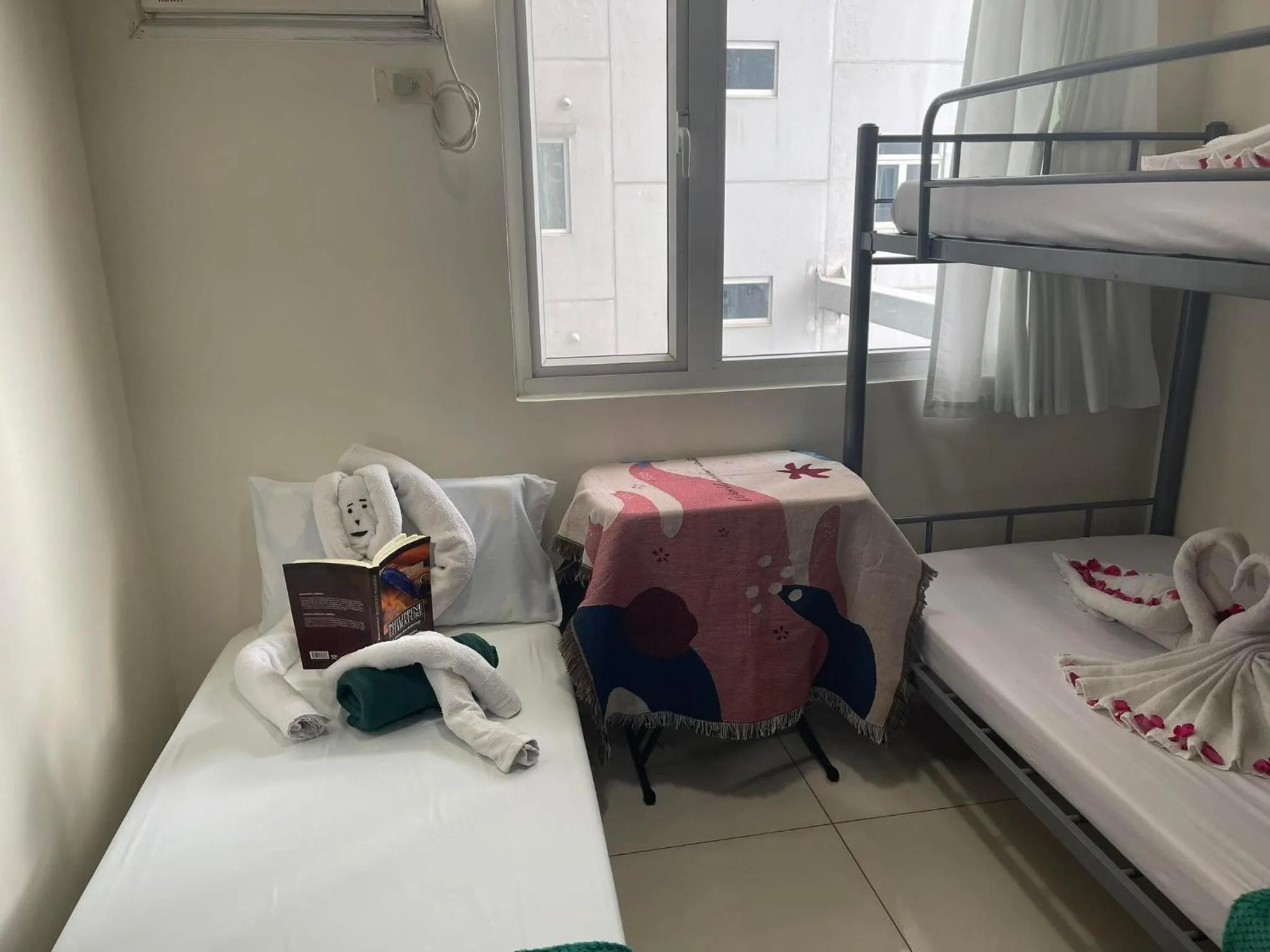 Bed in Green Residences Stays by PBYY