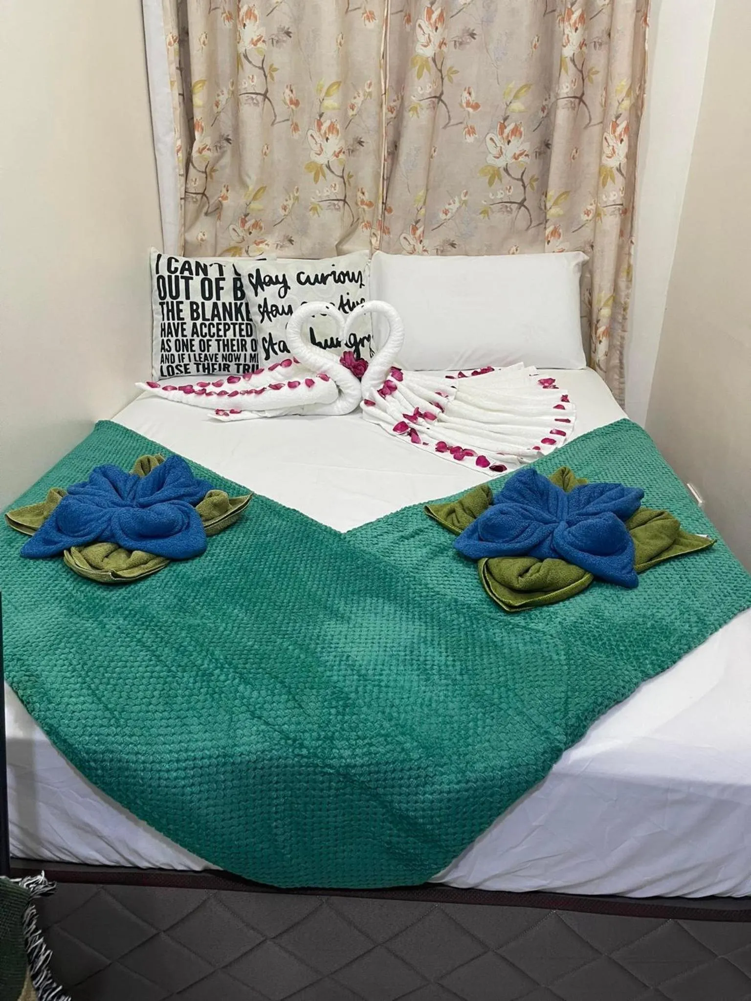 Bed in Green Residences Stays by PBYY