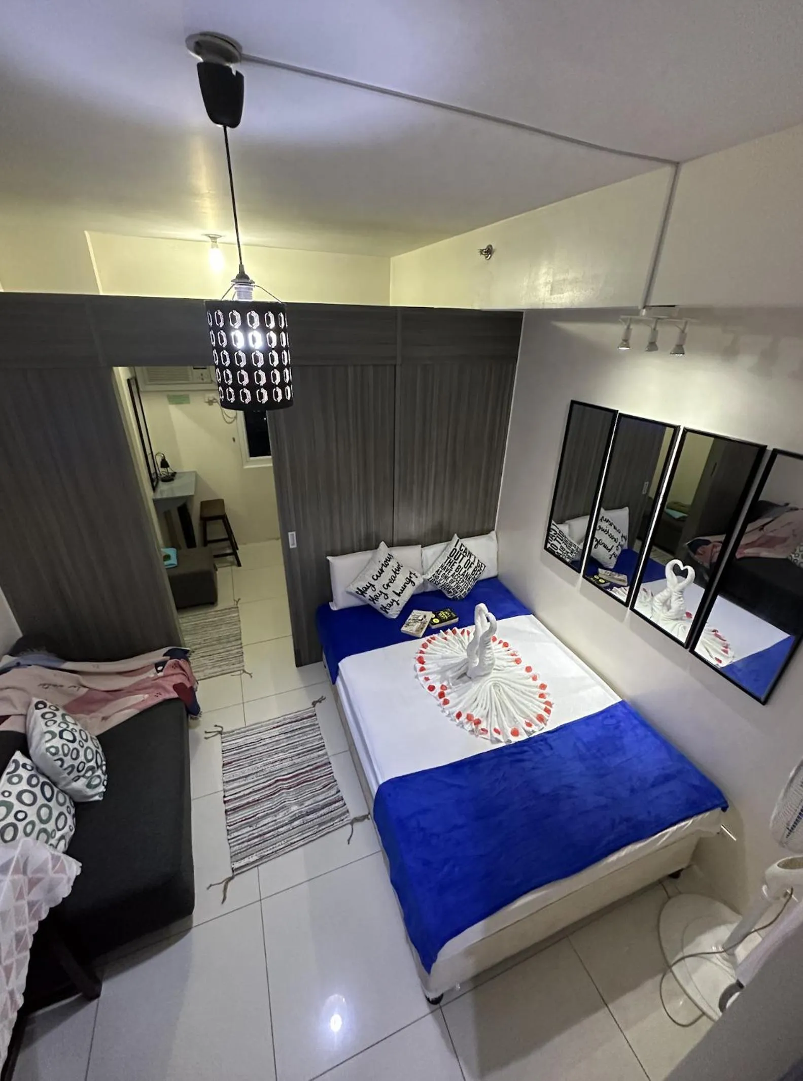 Bed in Green Residences Stays by PBYY