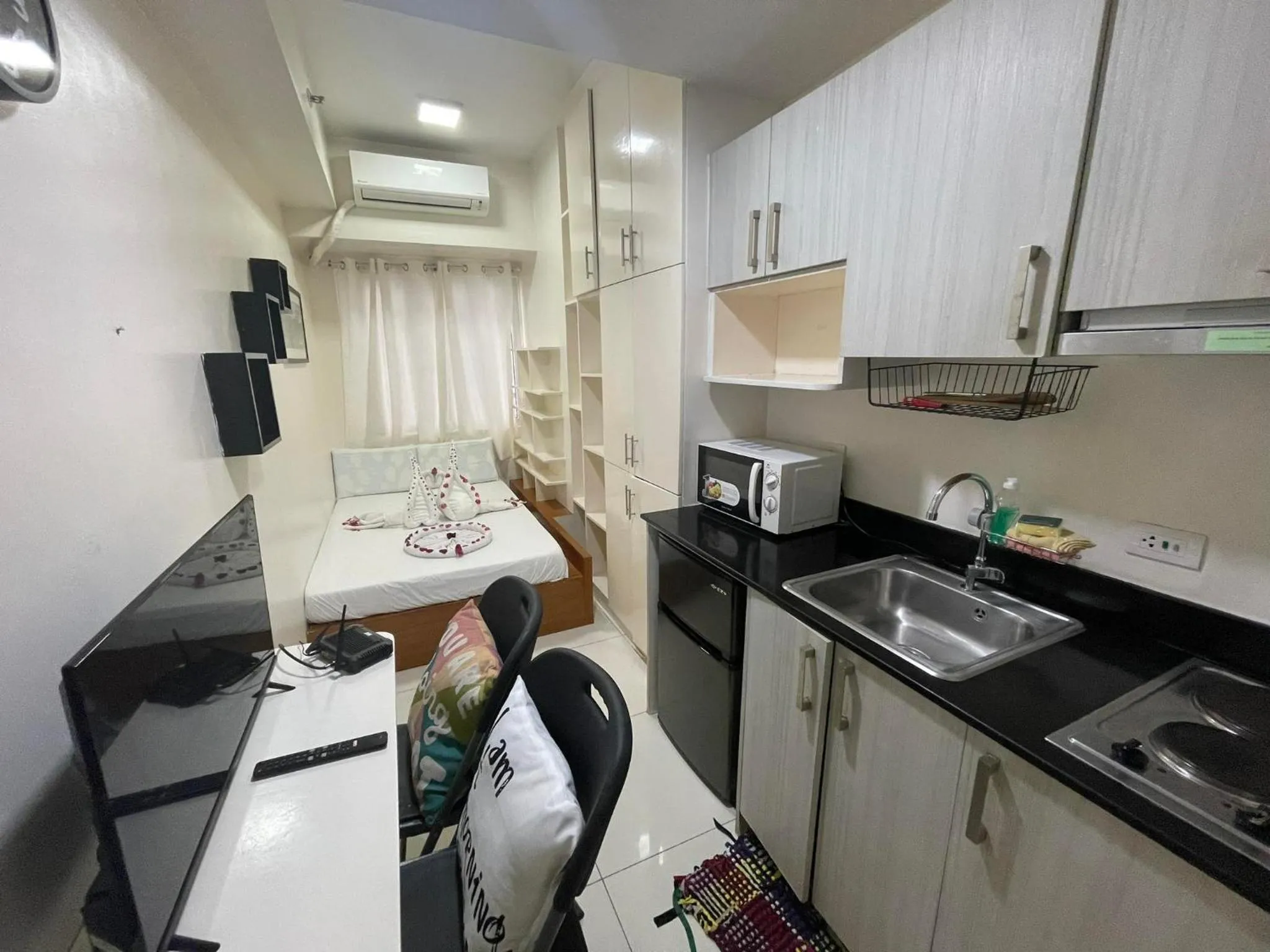 Kitchen or kitchenette in Green Residences Stays by PBYY