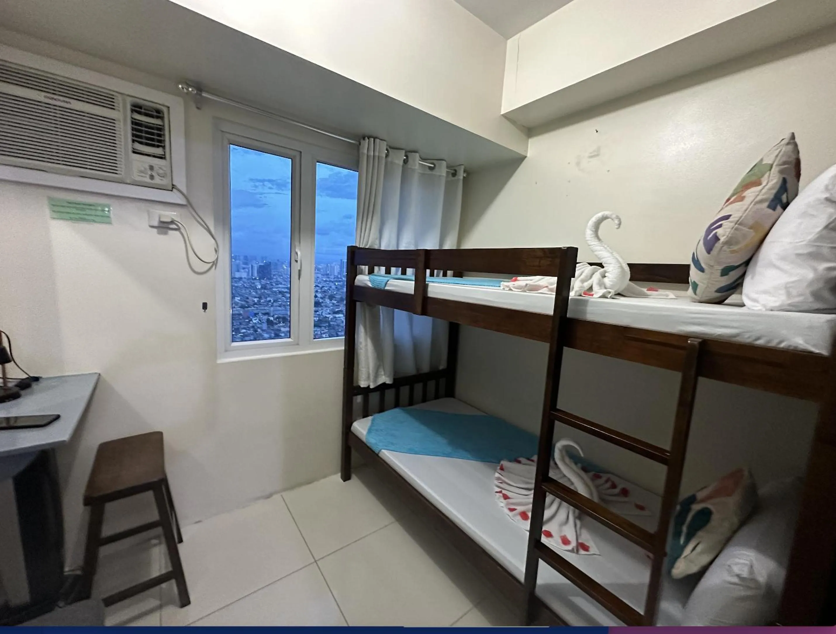 Bed in Green Residences Stays by PBYY