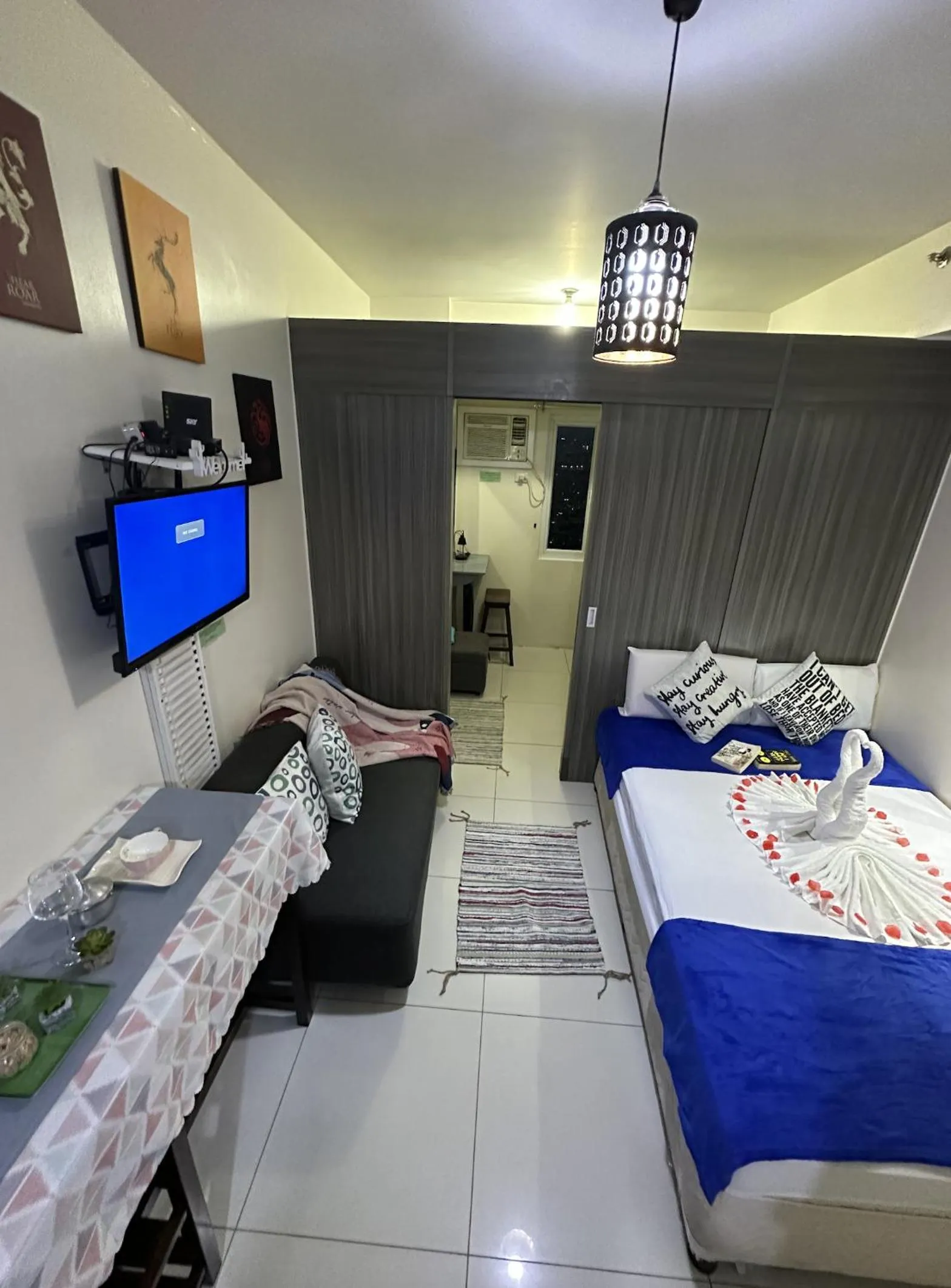 Bed in Green Residences Stays by PBYY