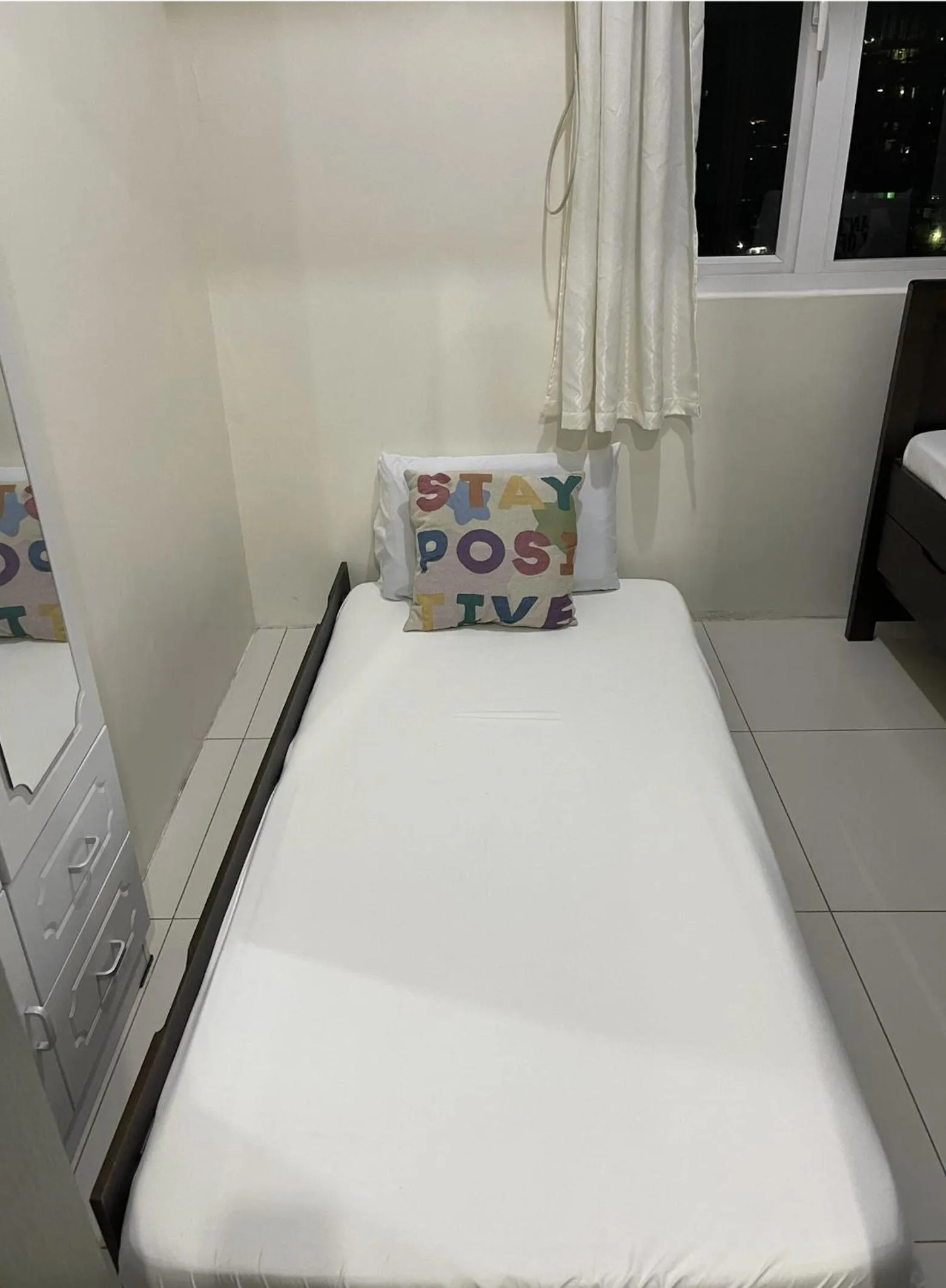 Bed in Green Residences Stays by PBYY