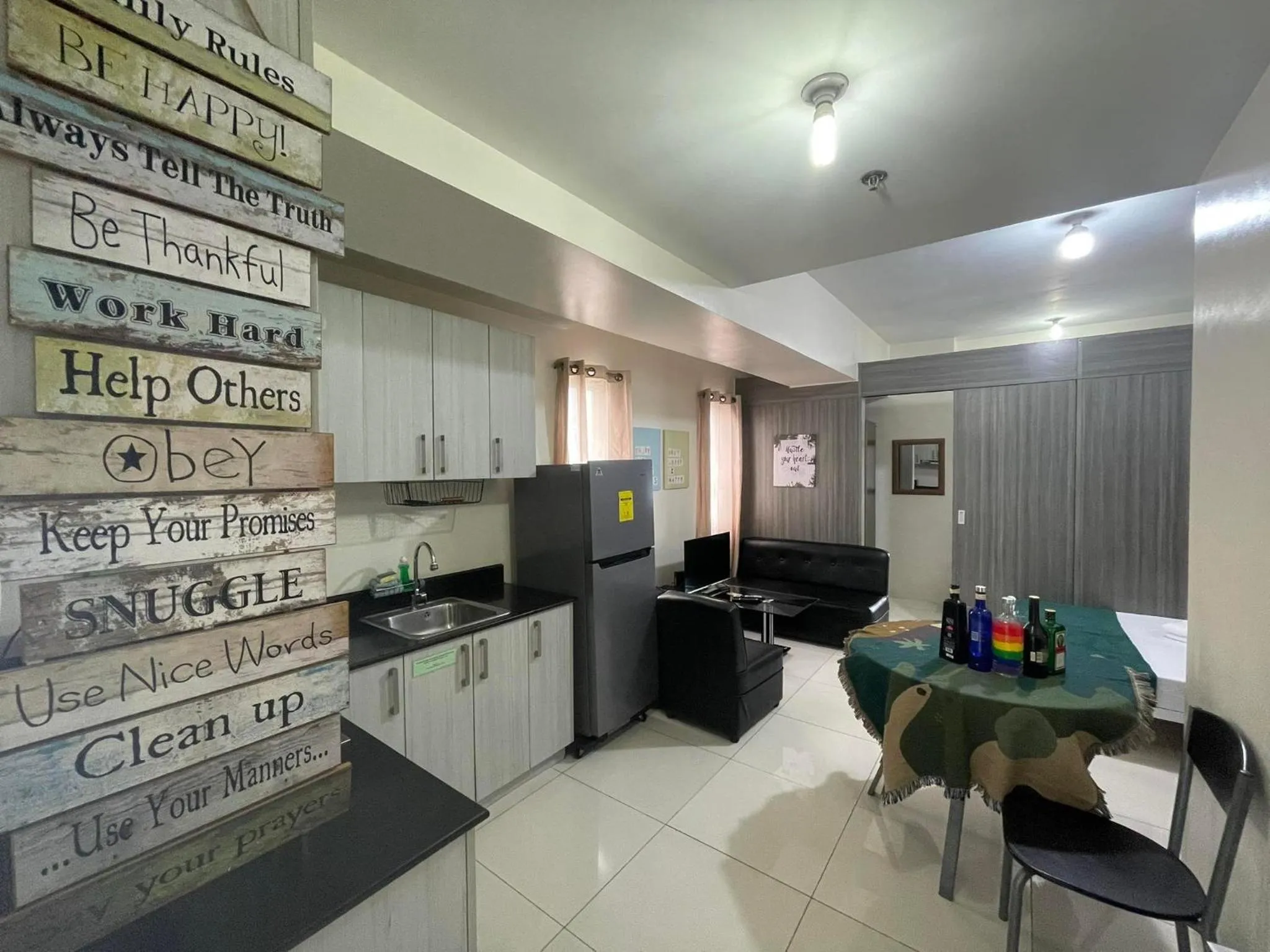 Kitchen or kitchenette in Green Residences Stays by PBYY