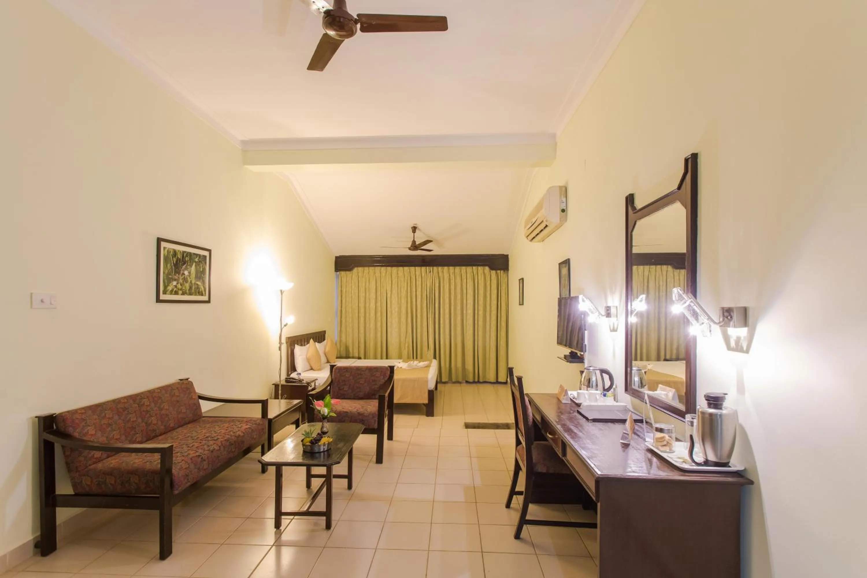 Bedroom in Hotel Coorg International