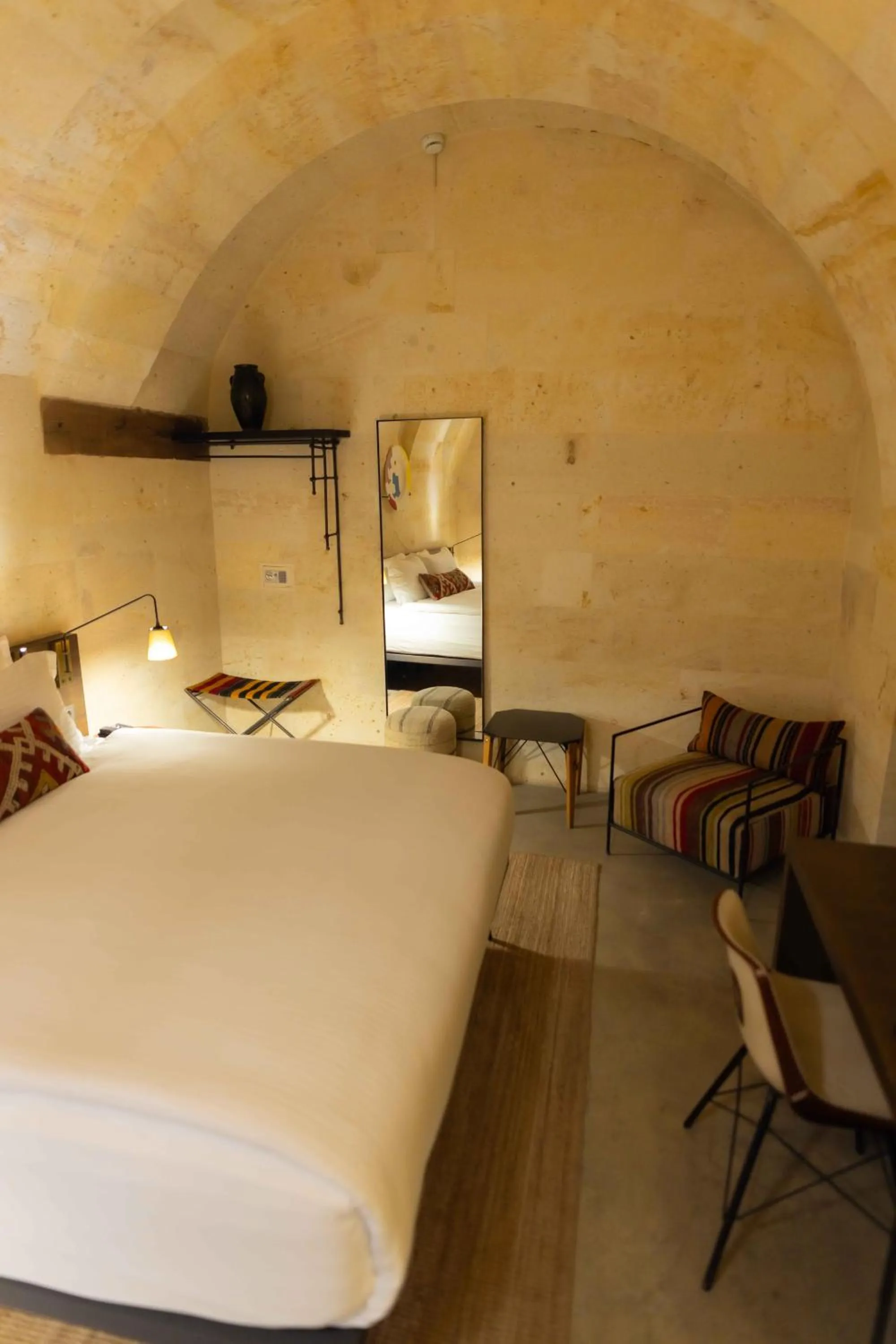 Seating area, Bed in Carus Cappadocia