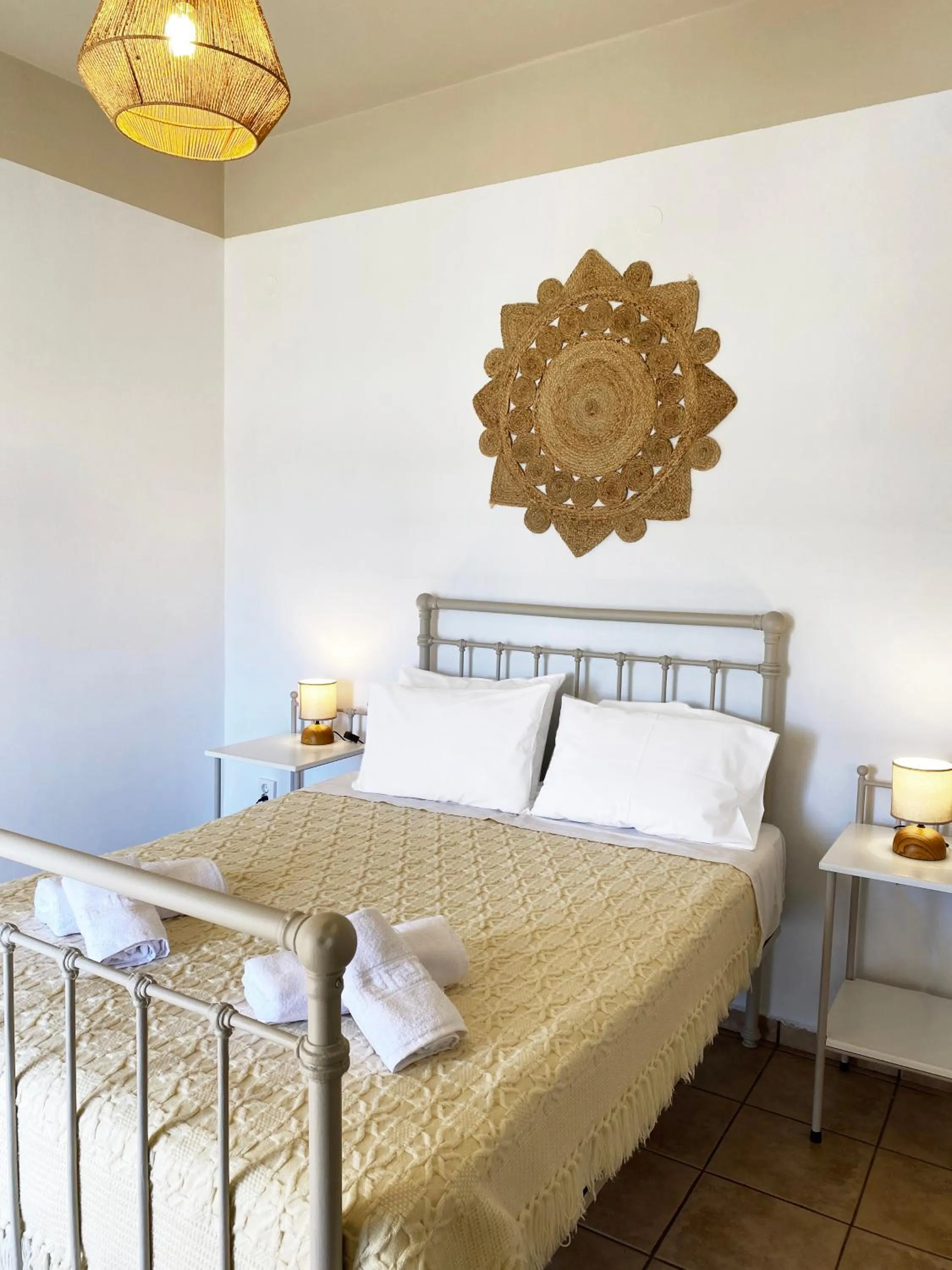Bed in Agnadi Syros Beachfront Studios & Rooms