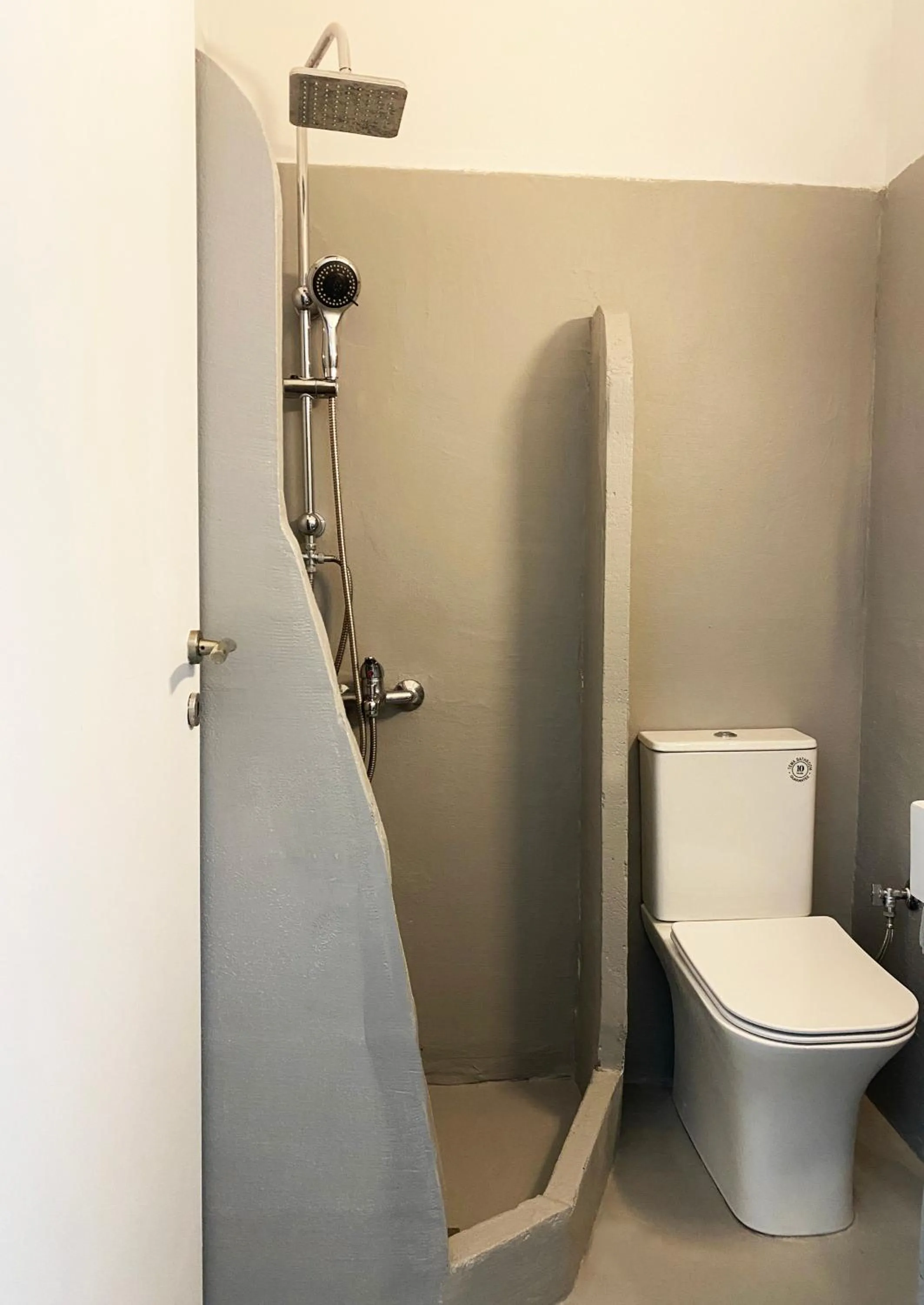 Shower in Agnadi Syros Beachfront Studios & Rooms