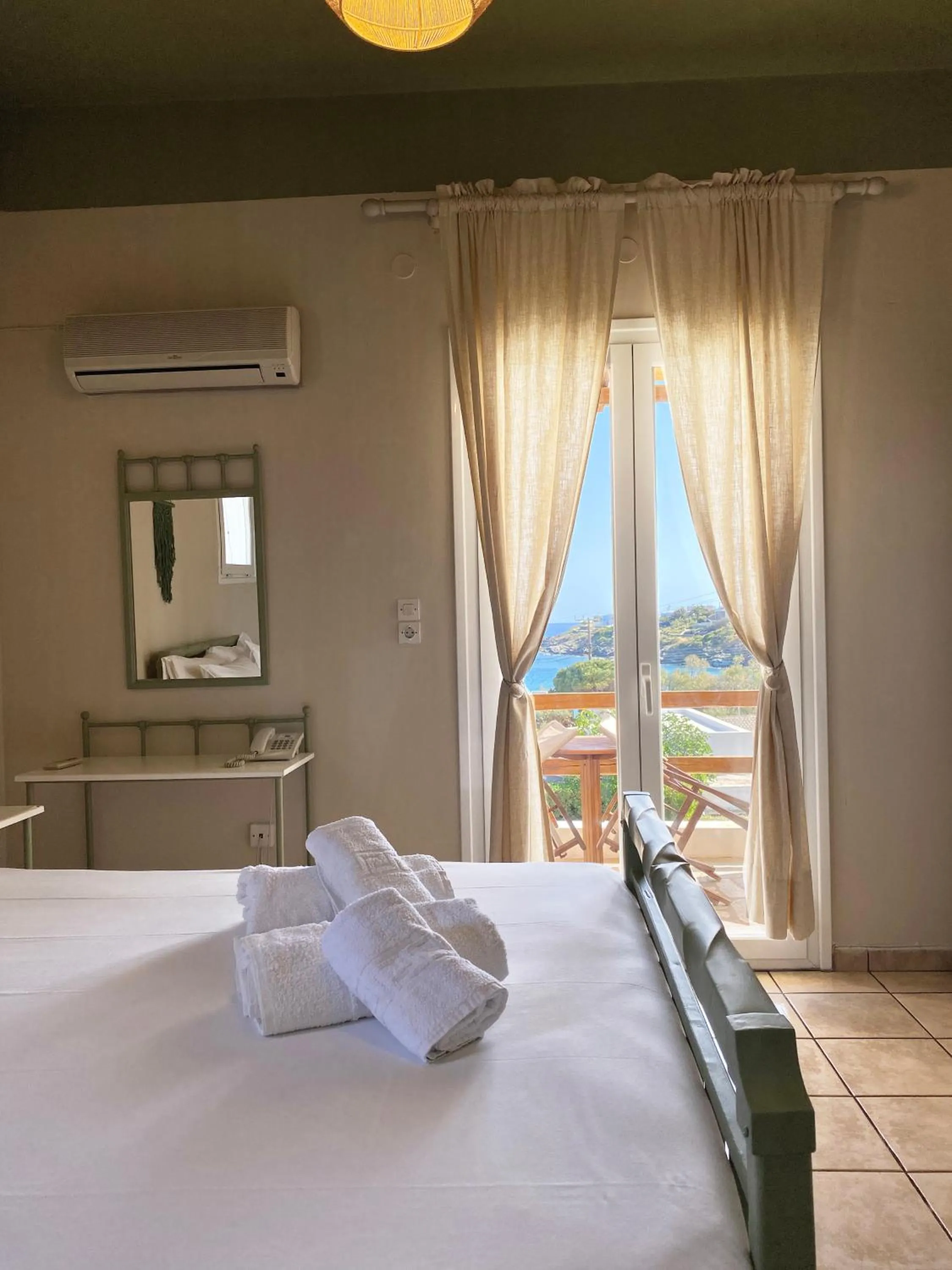 Balcony/Terrace, Bed in Agnadi Syros Beachfront Studios & Rooms