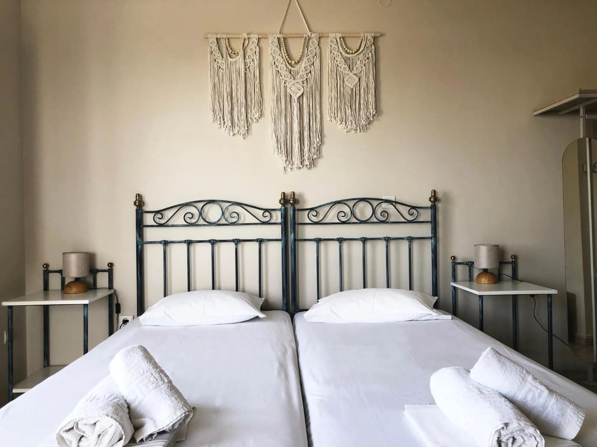 Bed in Agnadi Syros Beachfront Studios & Rooms