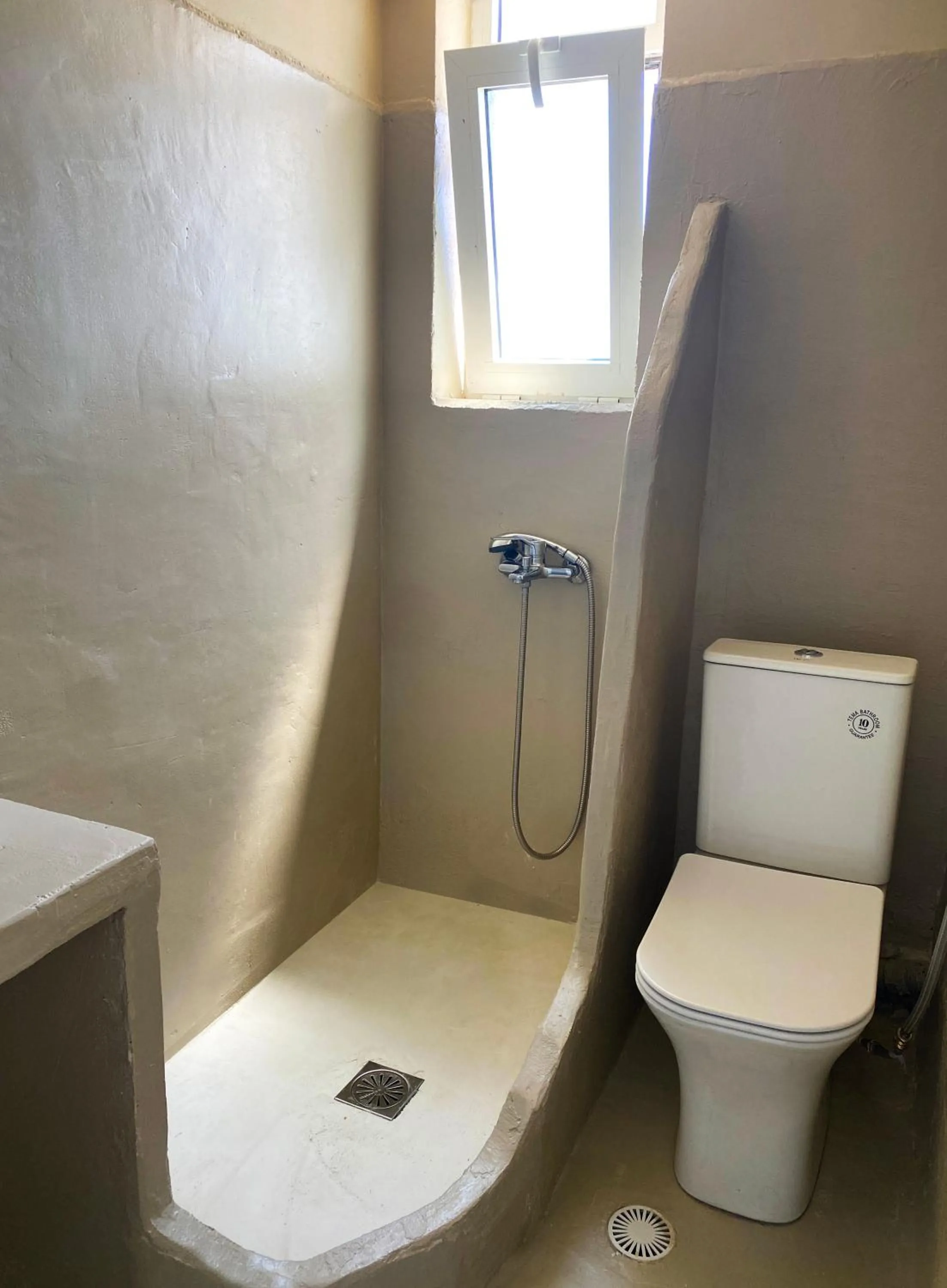 Shower in Agnadi Syros Beachfront Studios & Rooms