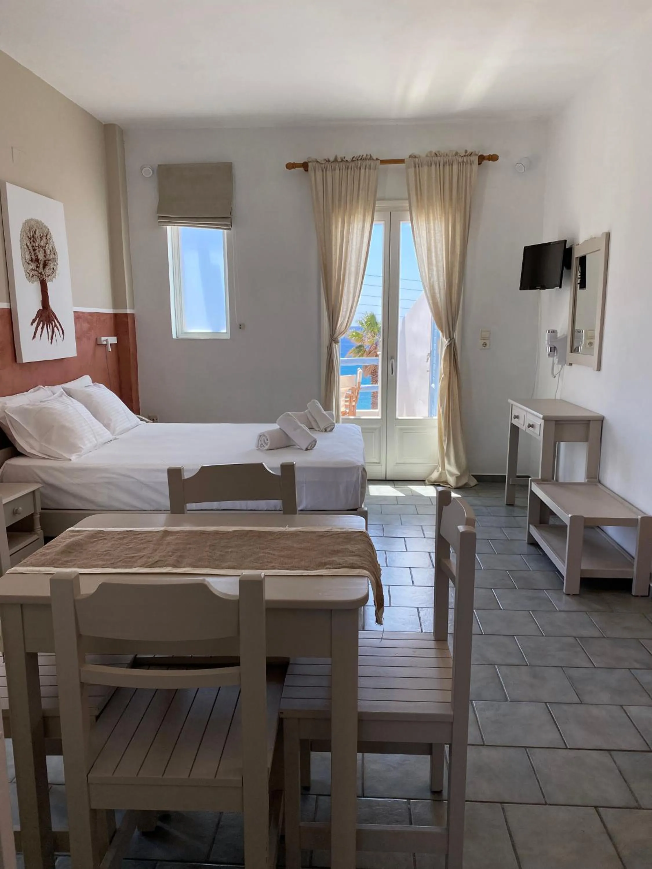 TV and multimedia, Bed in Agnadi Syros Beachfront Studios & Rooms