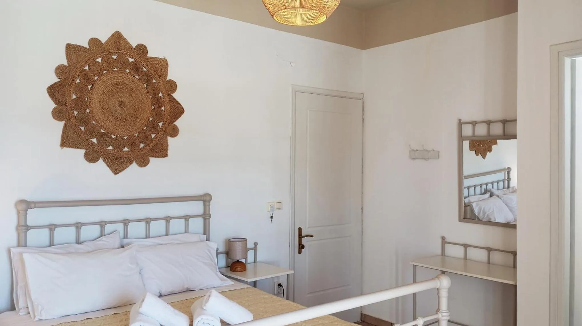 Bed in Agnadi Syros Beachfront Studios & Rooms