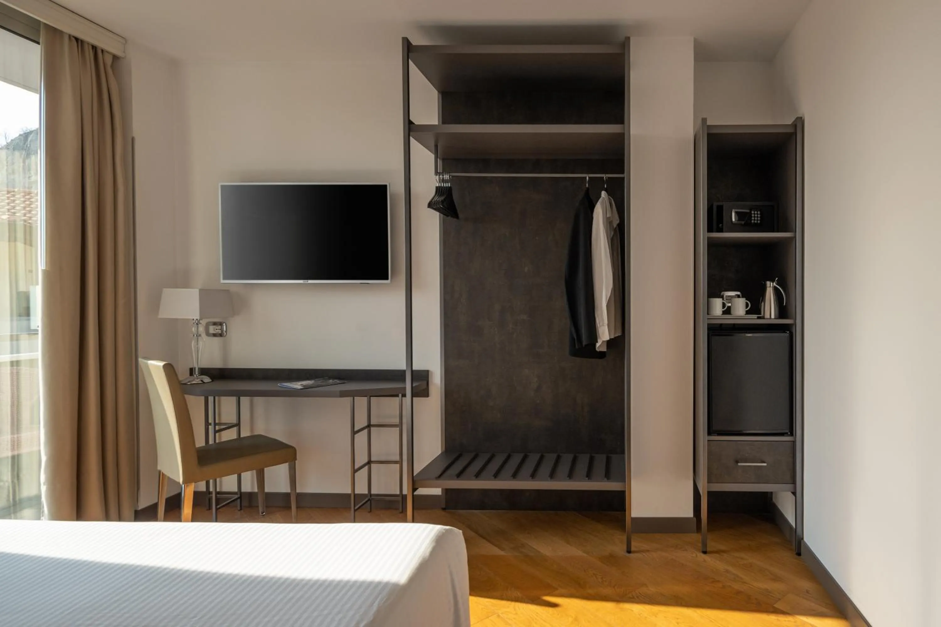 Bedroom in Hotel Continental - Tonelli Hotels